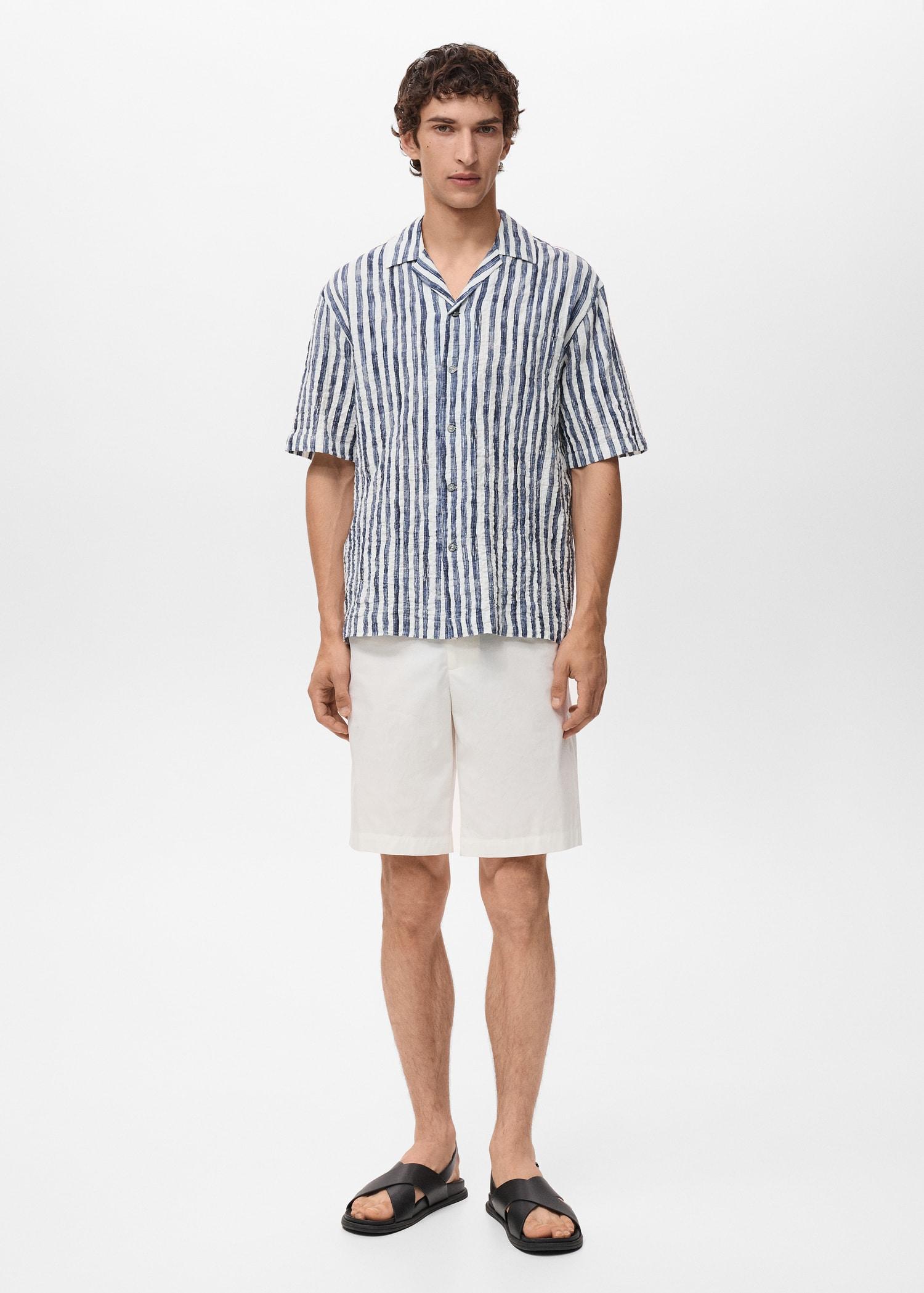 Short-sleeved striped cotton shirt - Men | MANGO USA Product Image
