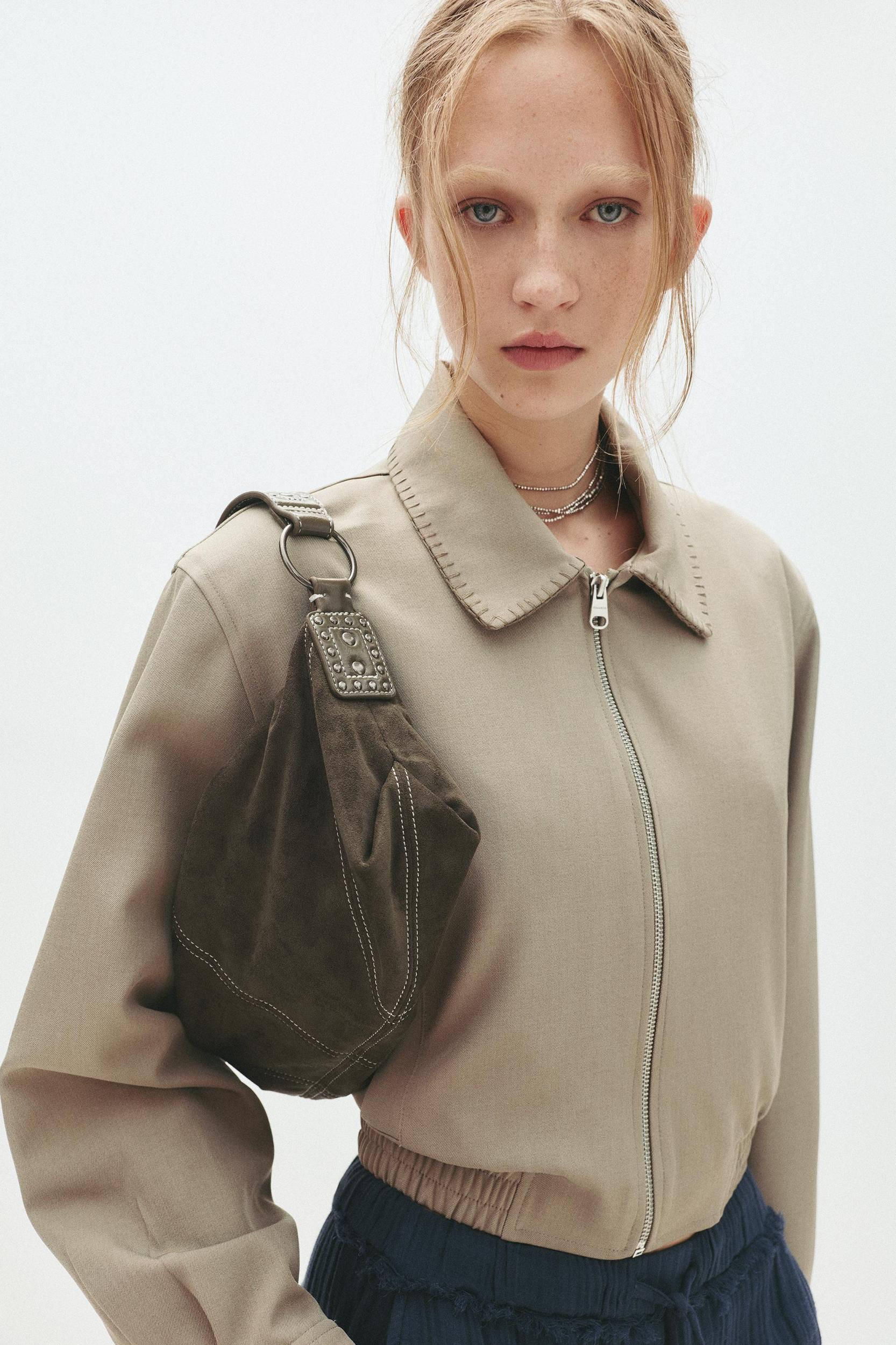 Crossbody bag with straps and topstitching Product Image