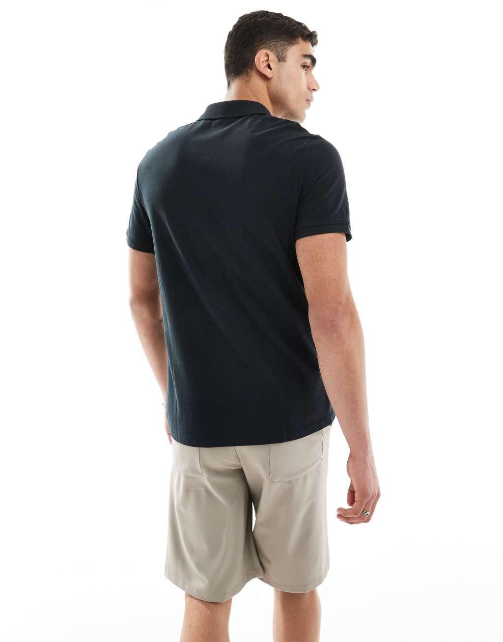 ASOS DESIGN pique polo in black Product Image