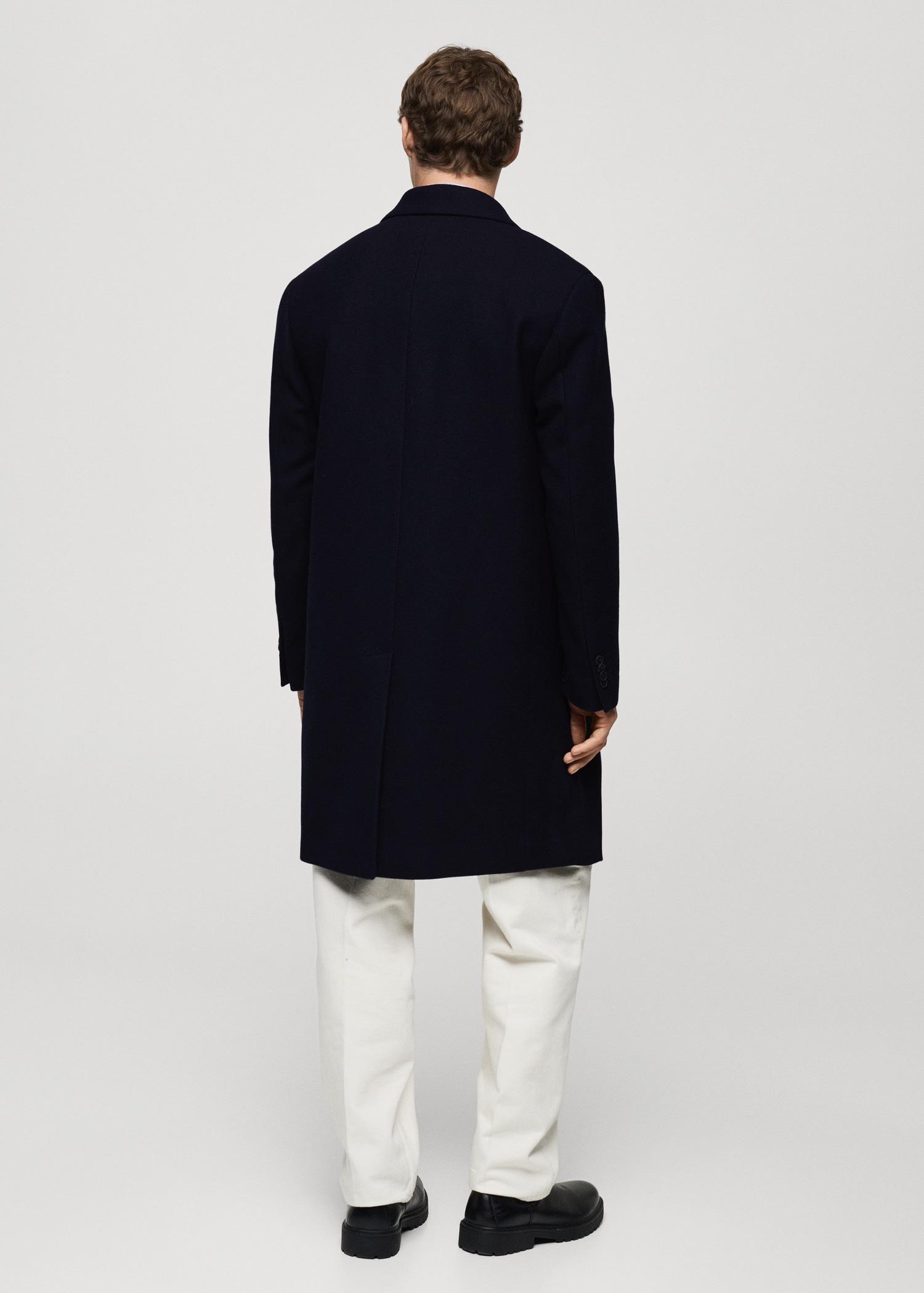 Relaxed-fit long wool coat - Men | MANGO USA Product Image
