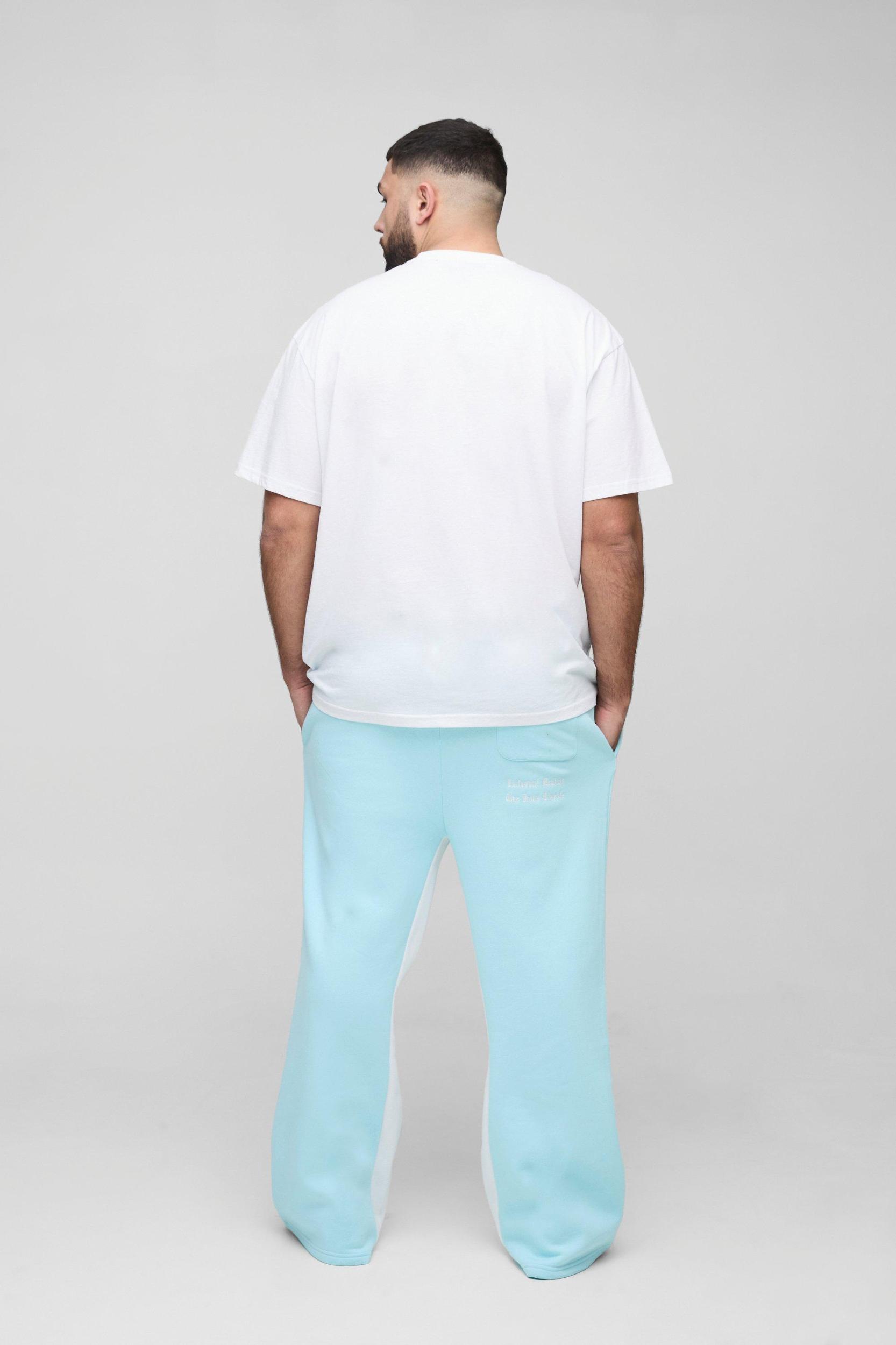 Plus Official Embroidery Relaxed Flare Sweatpants | boohooMAN USA Product Image