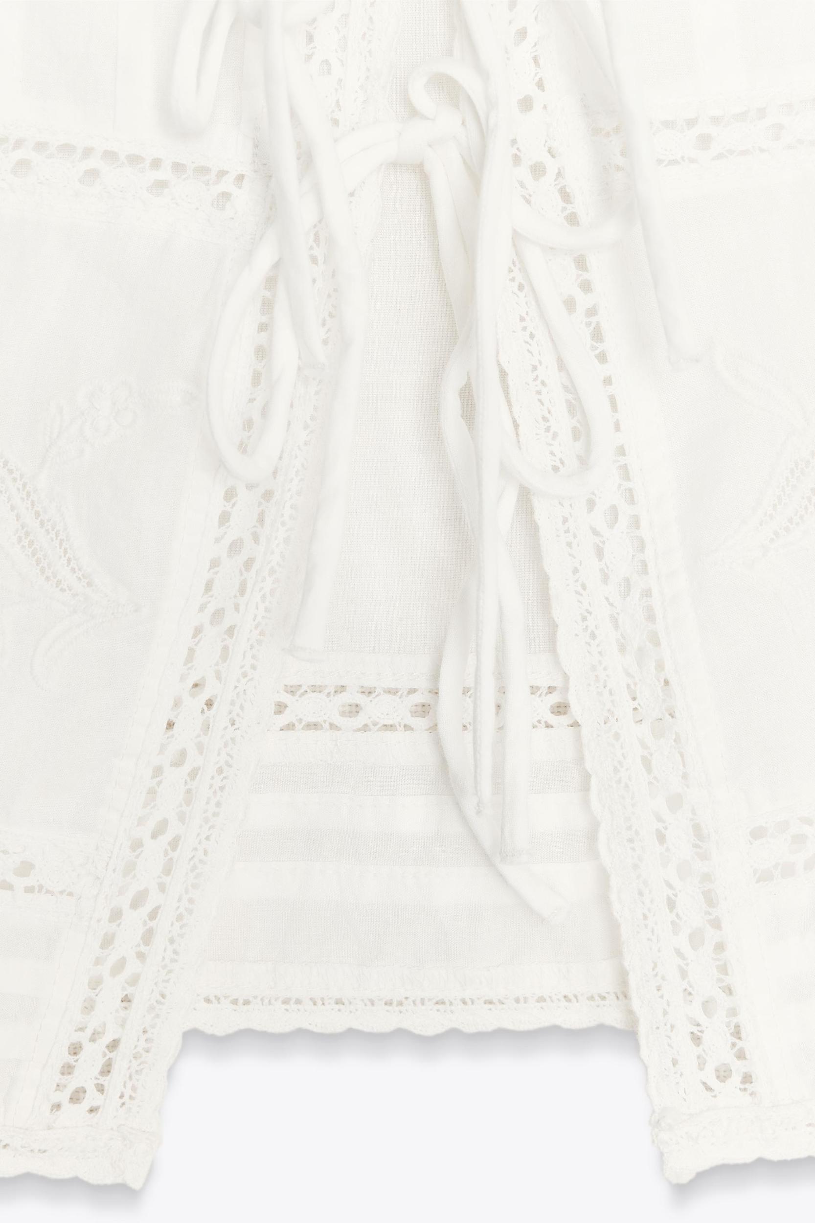 EMBROIDERED TIE TOP Product Image