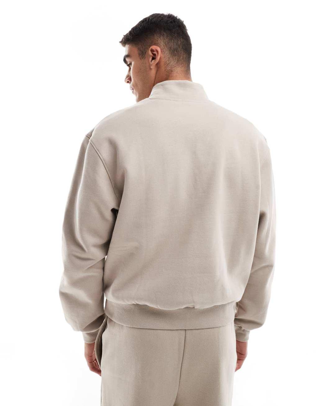 ASOS DESIGN premium heavyweight boxy oversized quarter zip sweatshirt 400gsm in beige Product Image