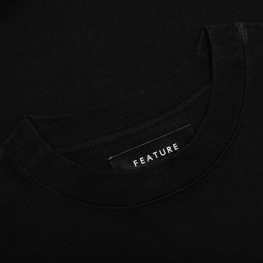Feature x Wynn Logo Lock Up Tee - Black Male Product Image
