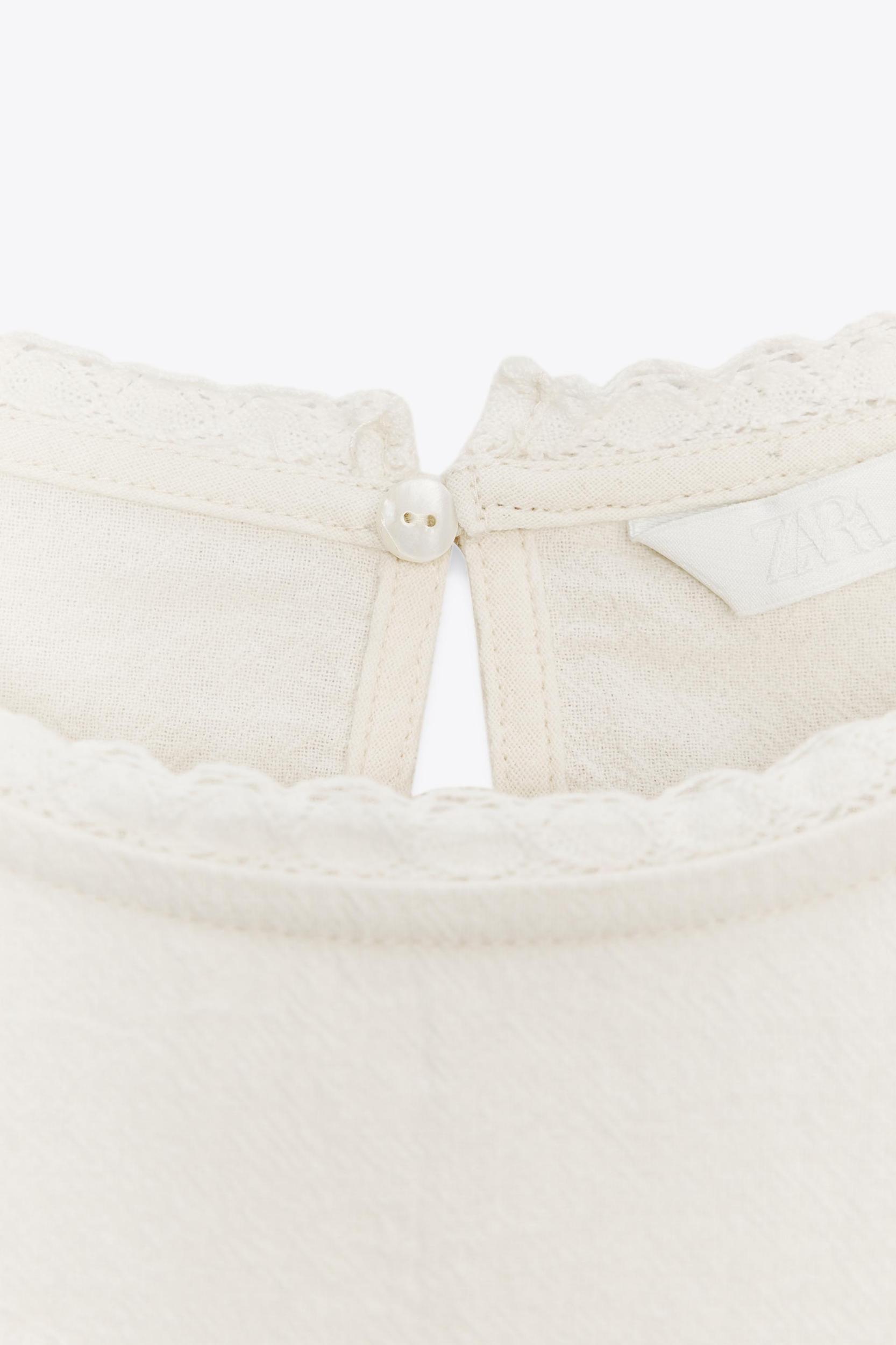 EMBROIDERED TIE TOP Product Image