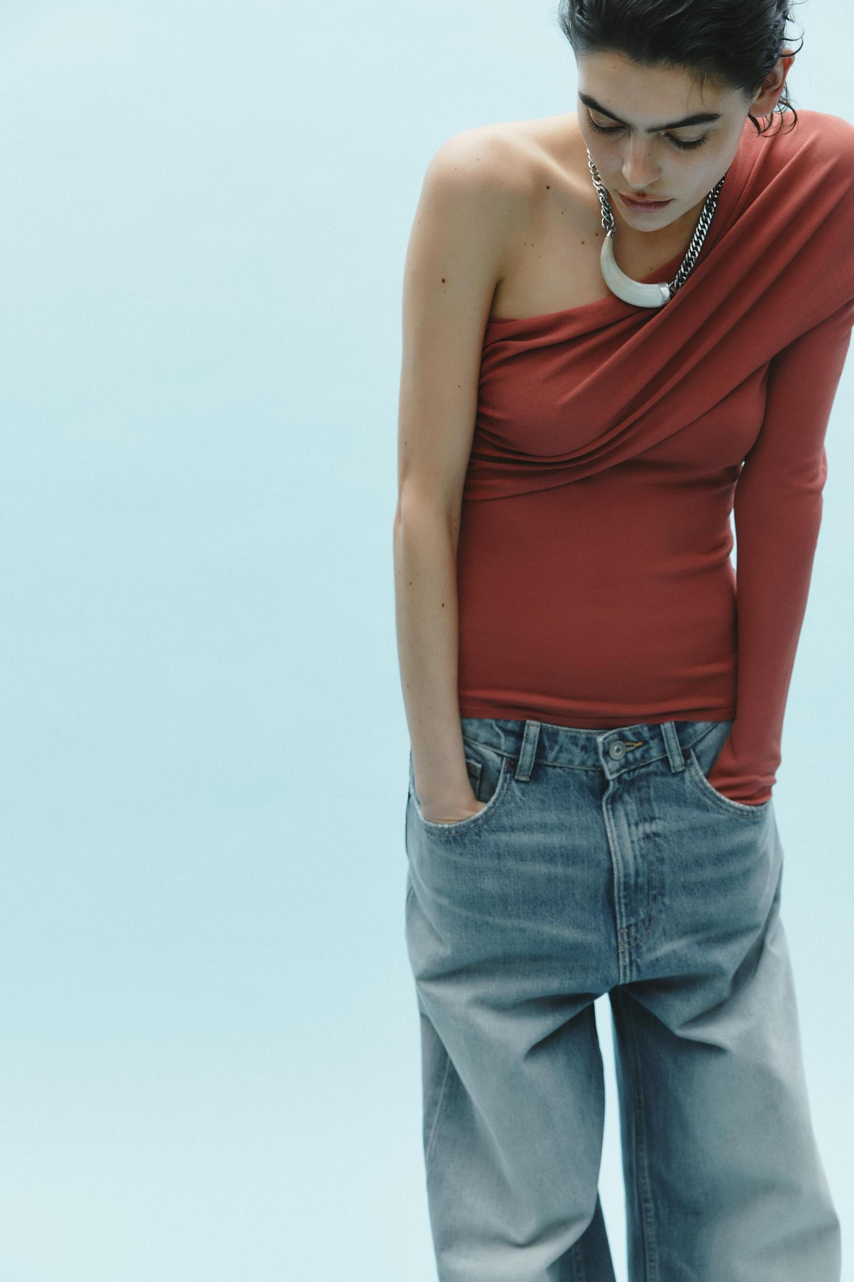 DRAPED KNIT ASYMMETRIC TOP Product Image