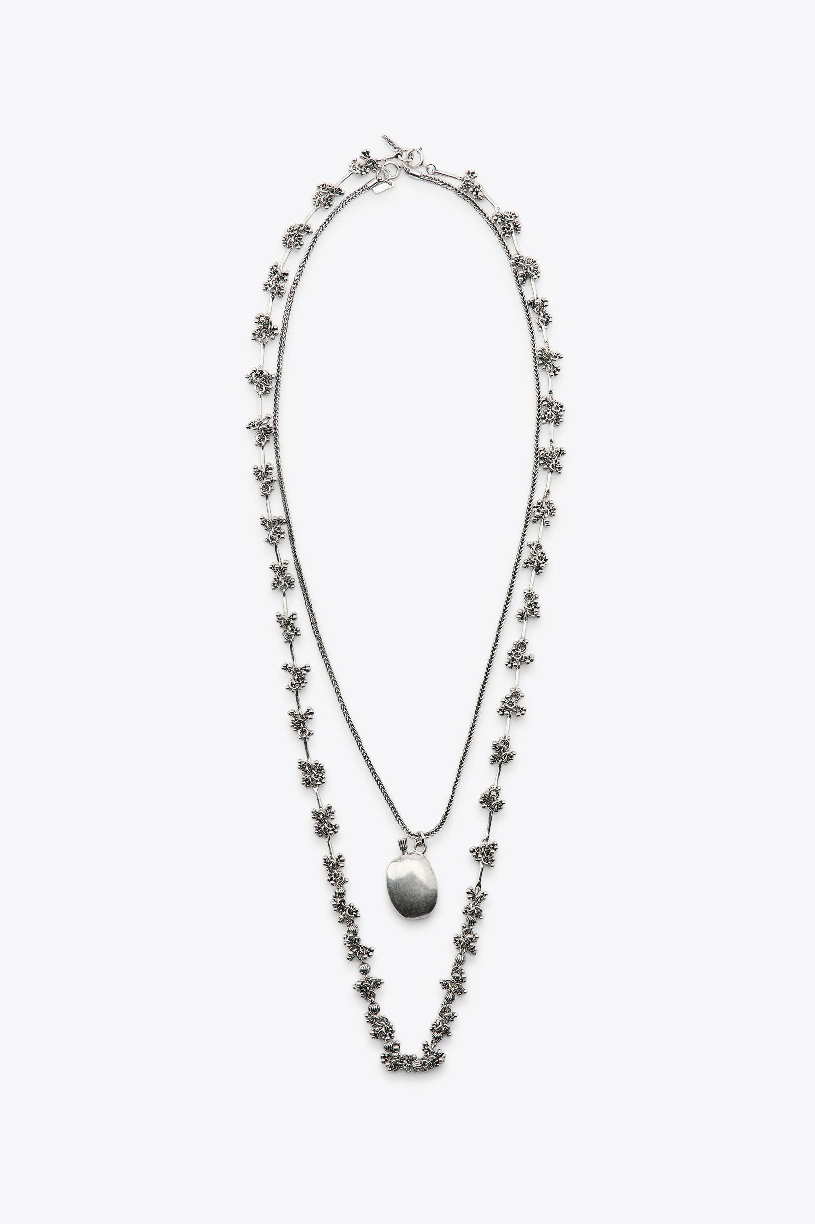 2-PACK NECKLACES WITH PIECES AND BOTTLE Product Image