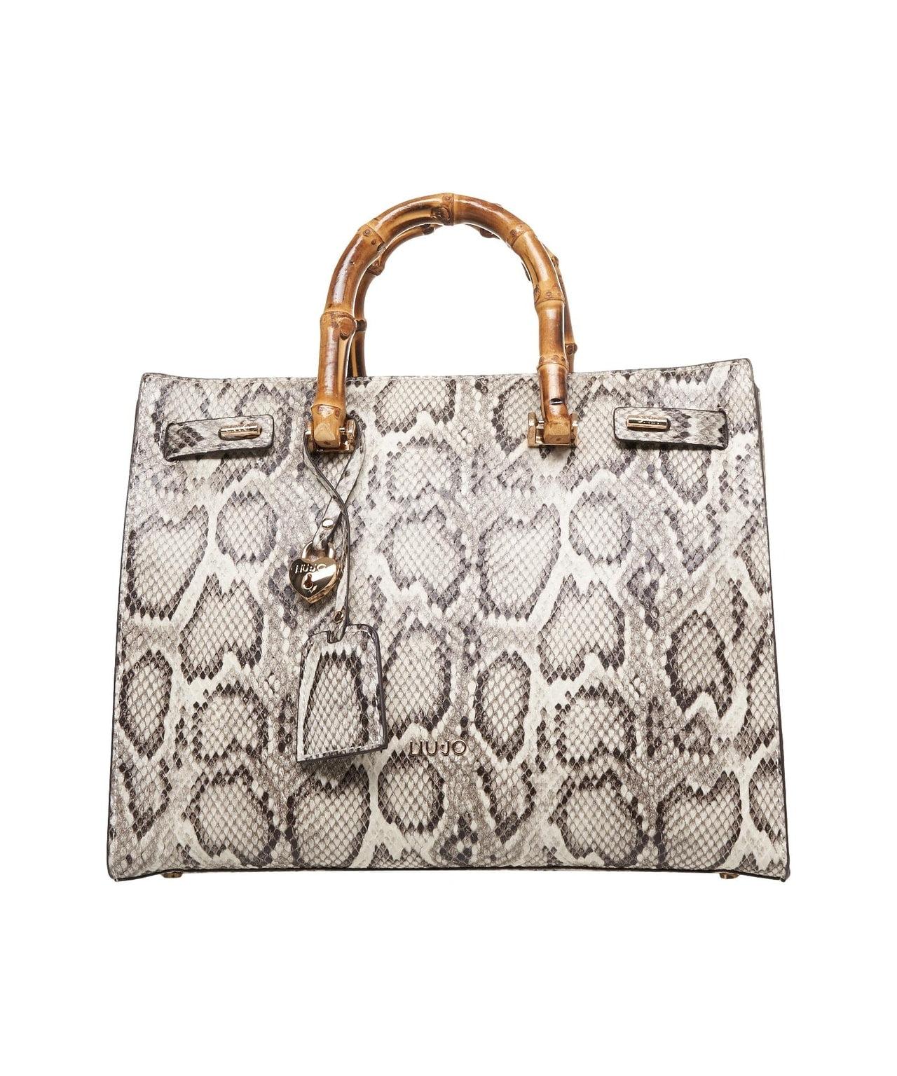 Hand bag with snake pattern Product Image