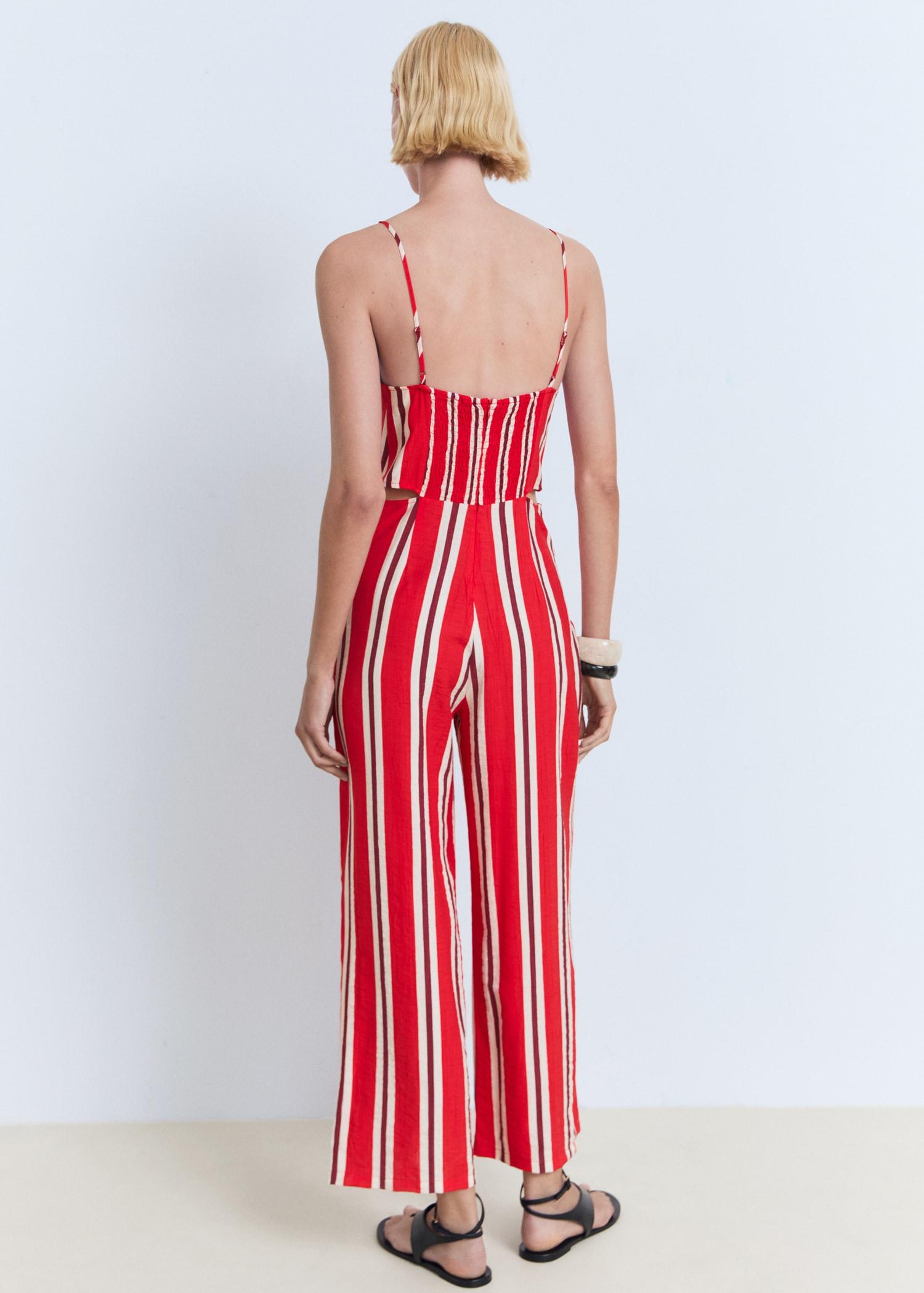 Striped jumpsuit with cut-out - Women | MANGO USA Product Image