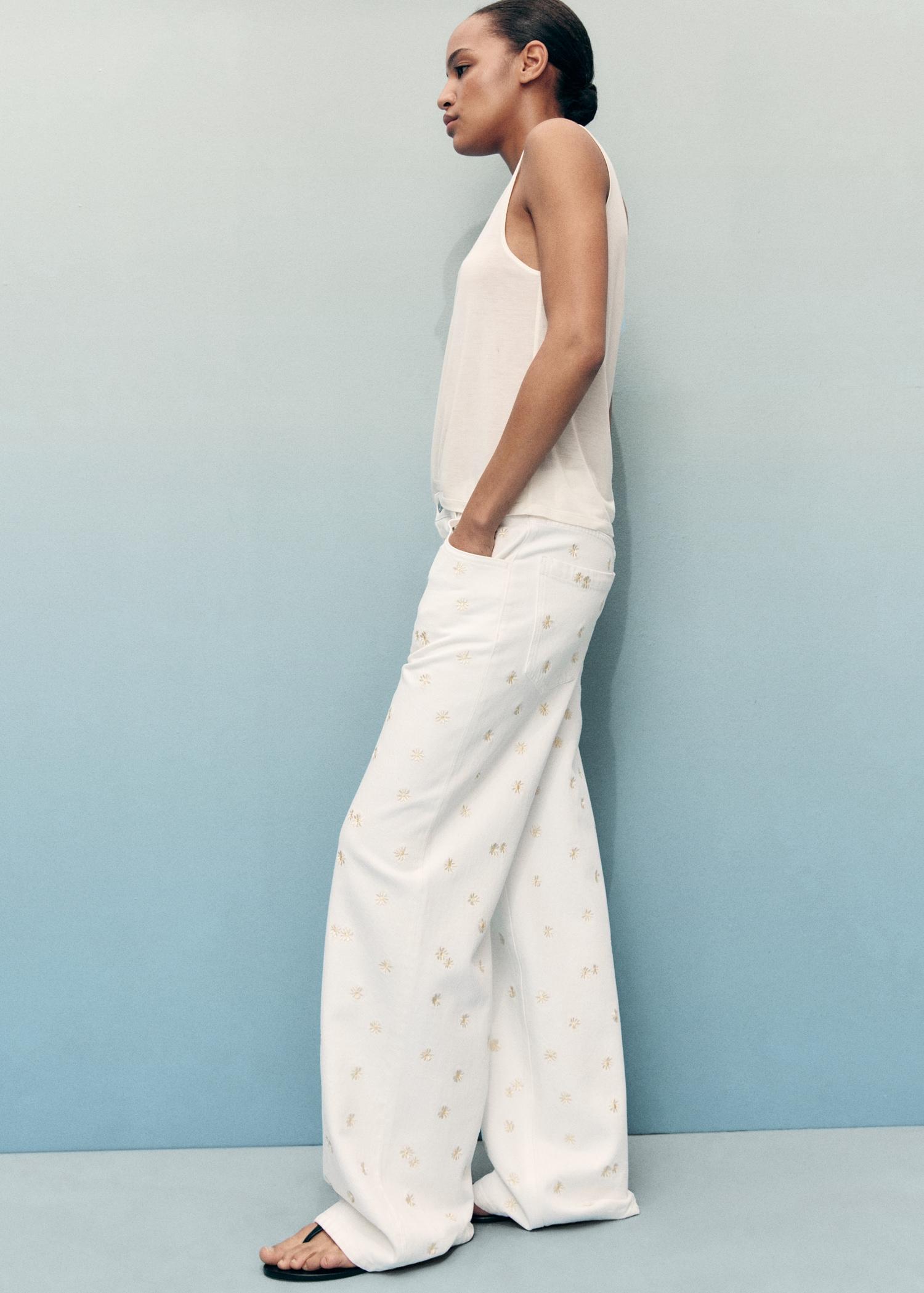 Flower-embroidered wideleg jeans - Women | MANGO USA Product Image