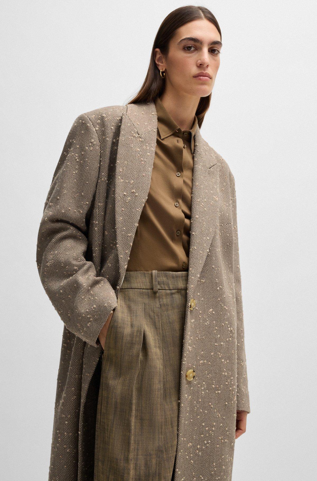 Herringbone-tweed coat with concealed closure in wool  Product Image
