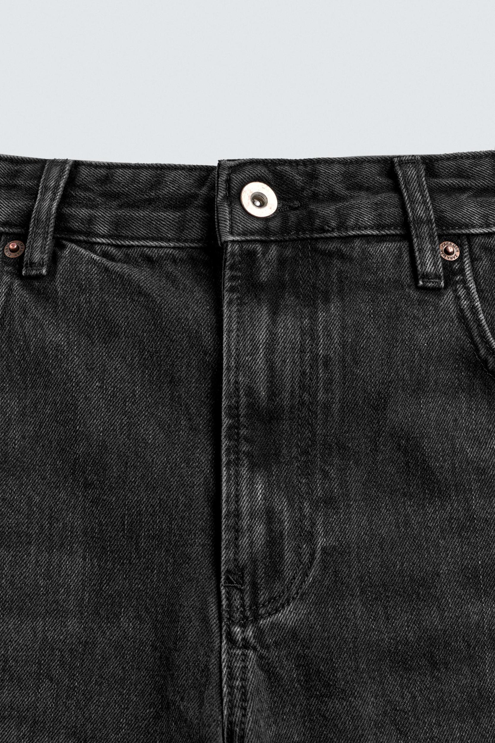 FLARE FIT RIPPED JEANS Product Image