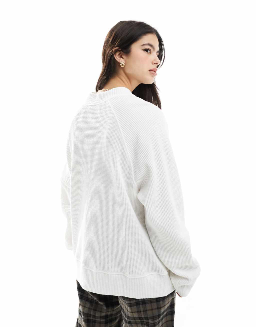 ASOS DESIGN heavyweight raglan high neck long sleeve waffle knit top in ecru Product Image