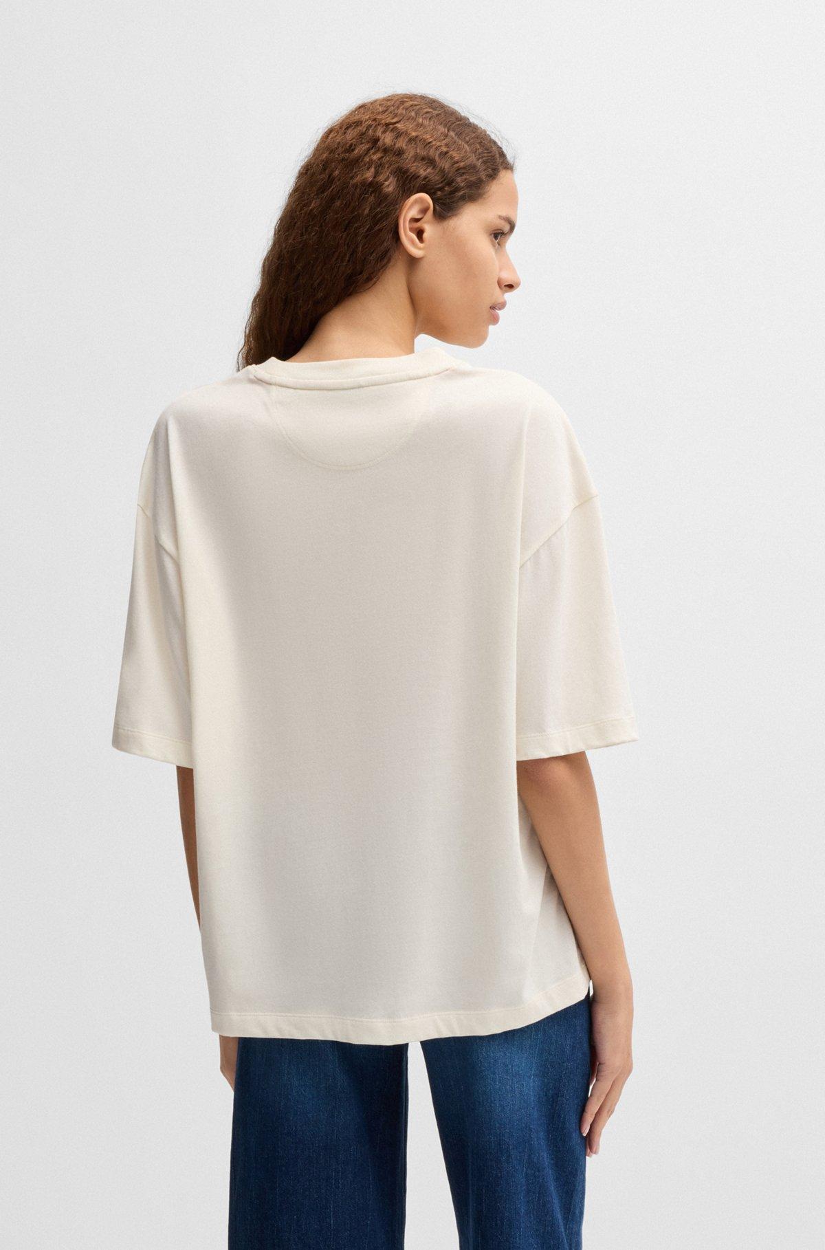 BOSS - Cotton-jersey oversize-fit T-shirt with seasonal artwork - White Product Image