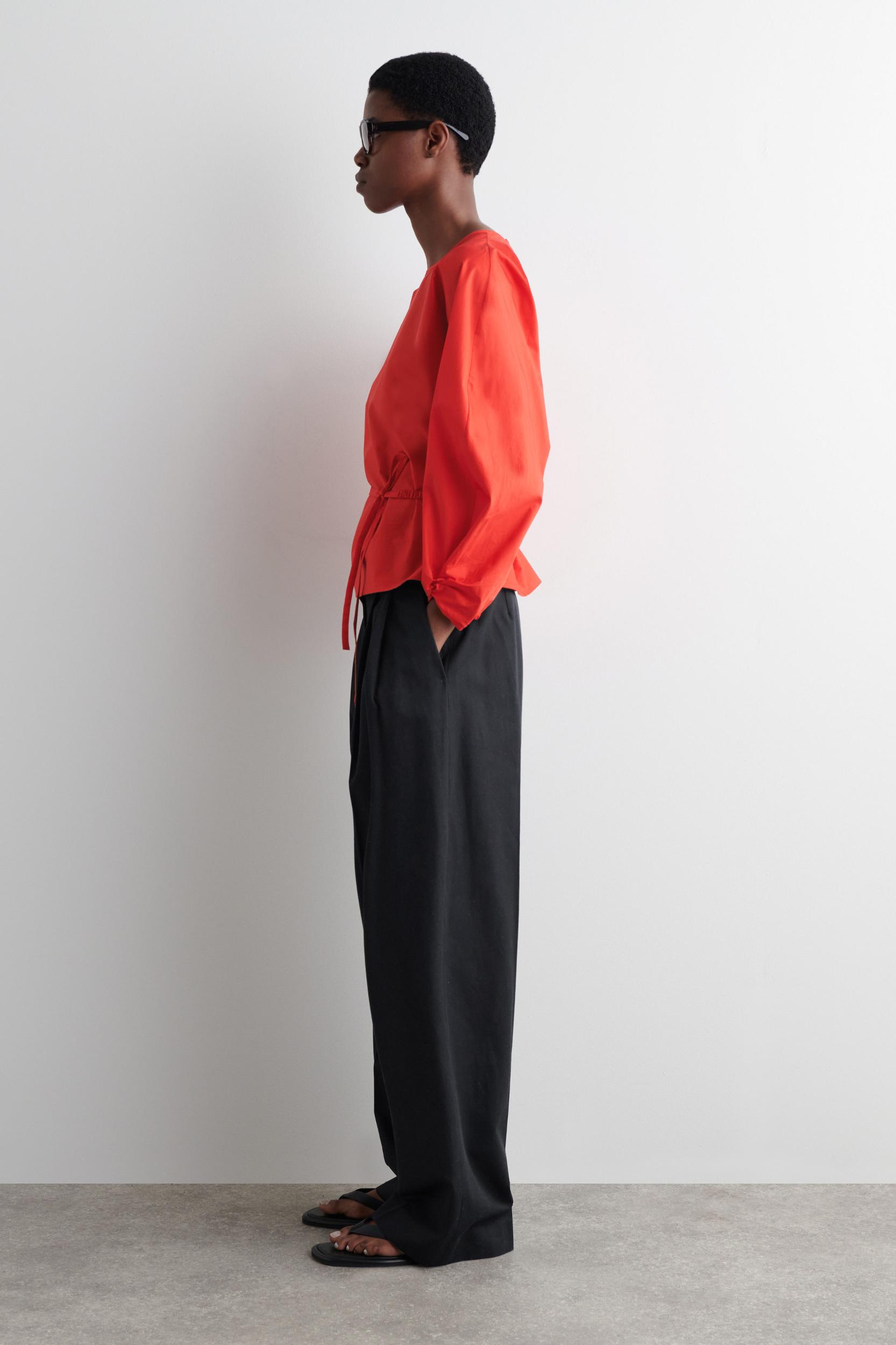 DRAWSTRING PEPLUM BLOUSE Product Image