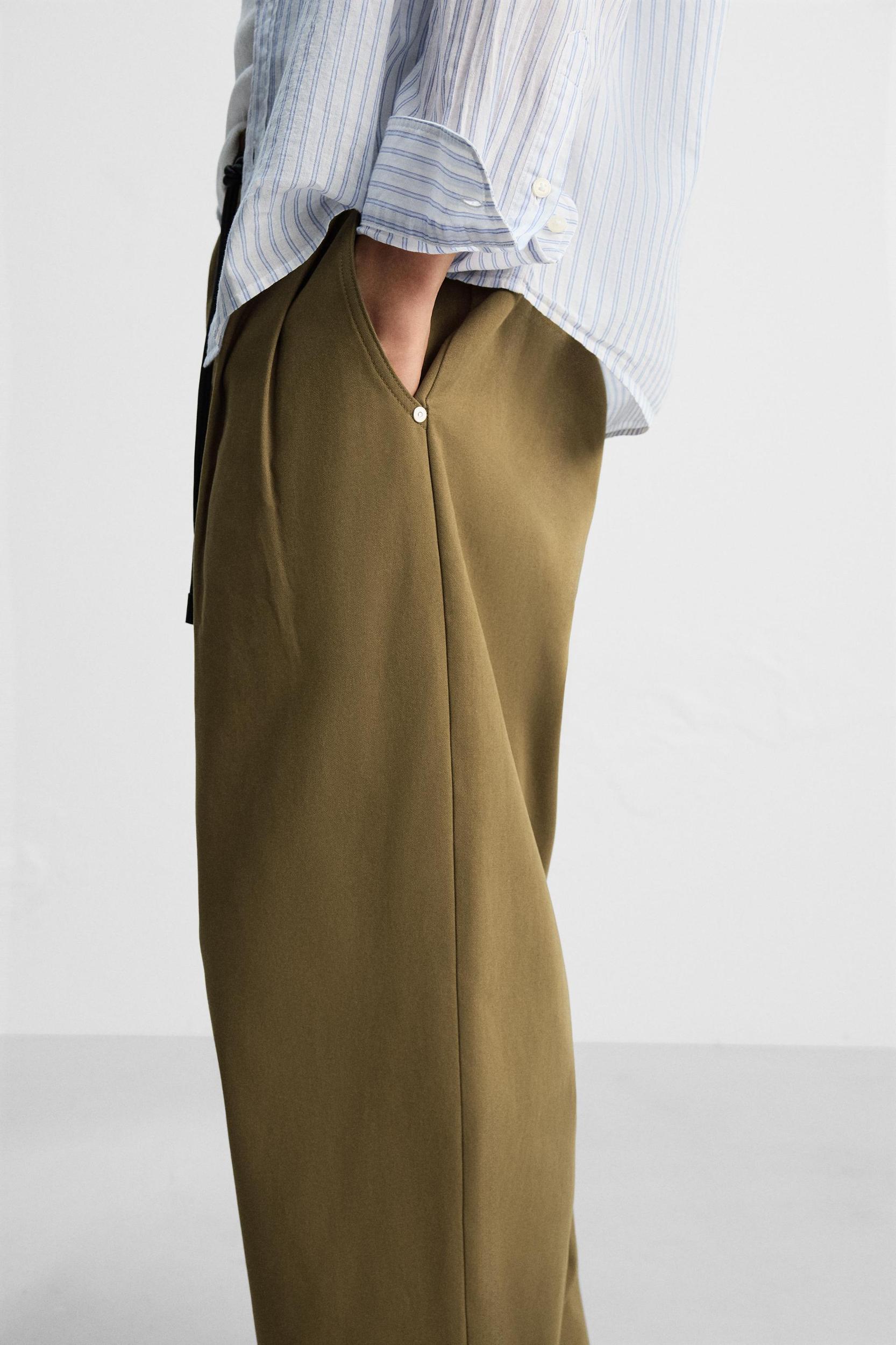 WIDE FIT CHINO PANTS Product Image