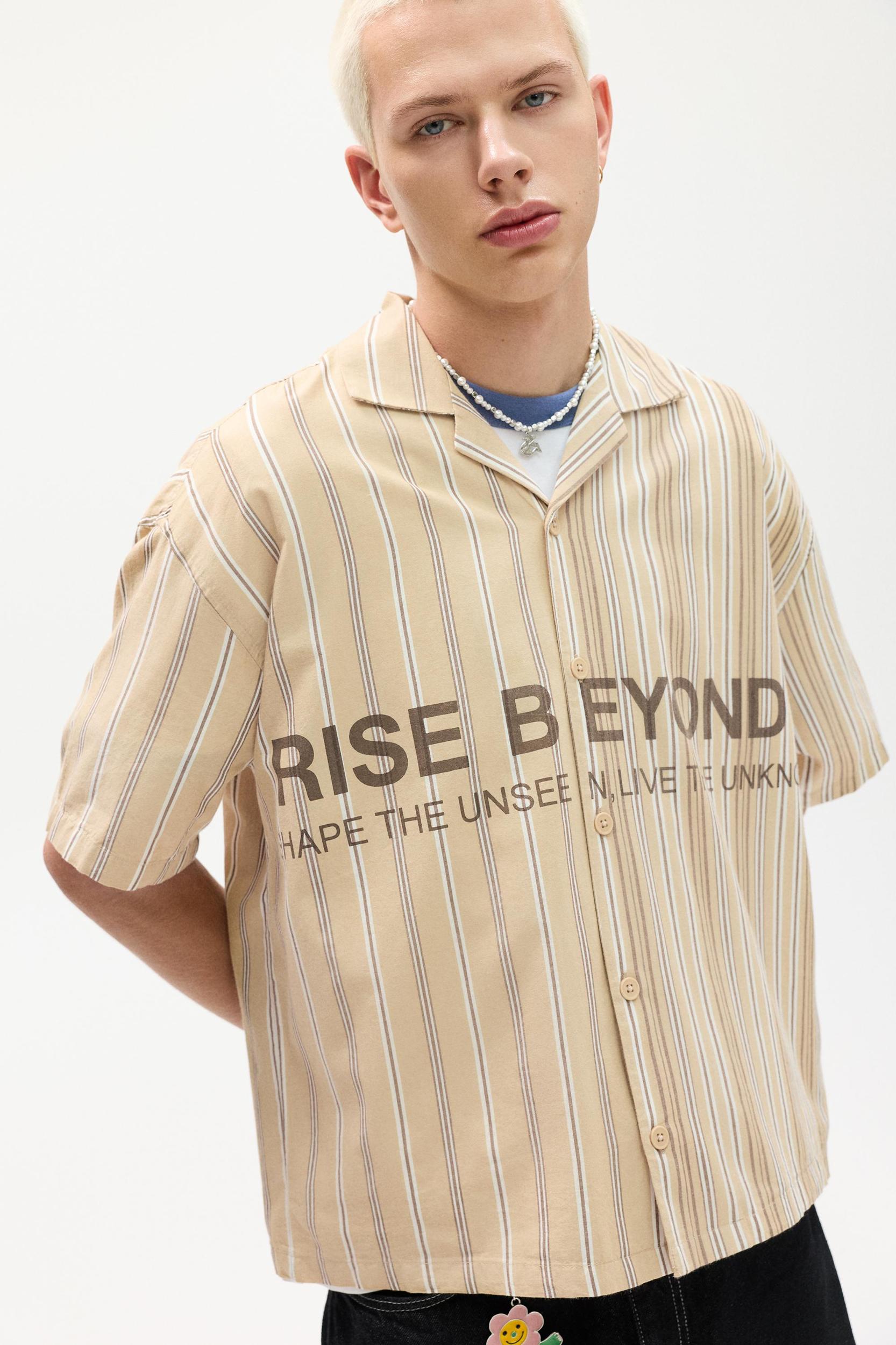 Short sleeve shirt with asymmetrical stripes Product Image