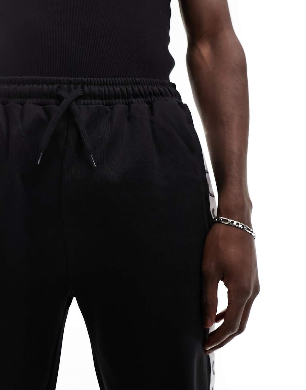 Fred Perry taped track sweatpants Product Image