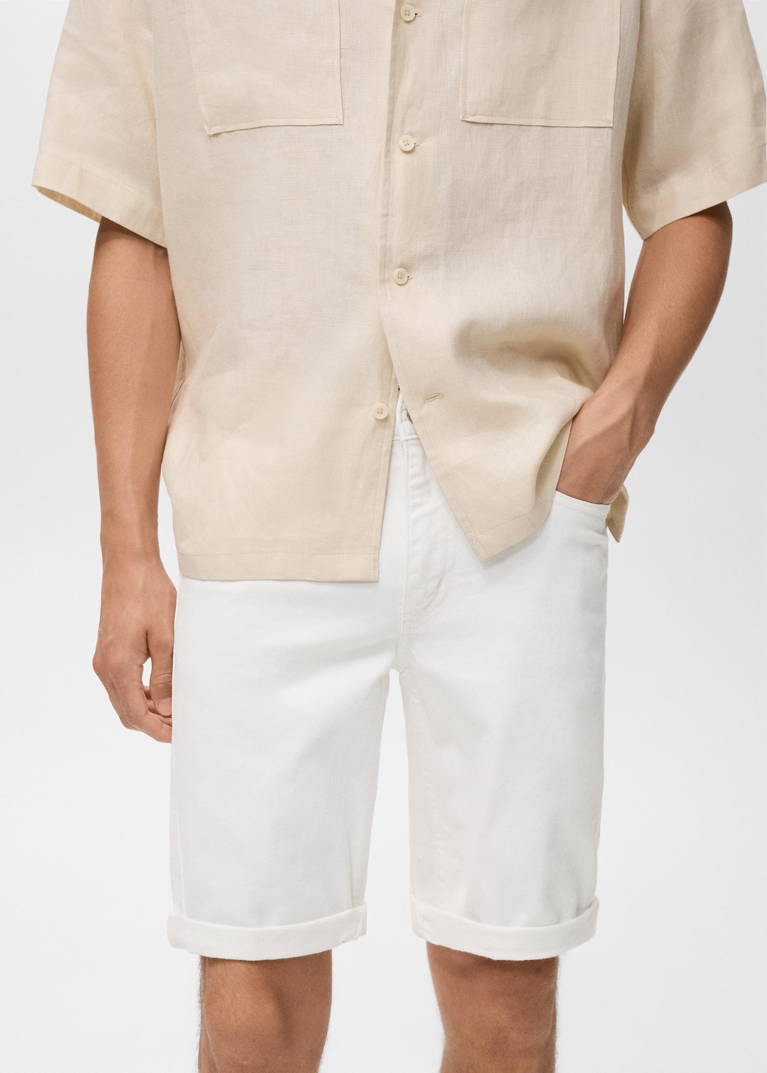 Slim-fit denim bermuda shorts - Men | MANGO USA Product Image