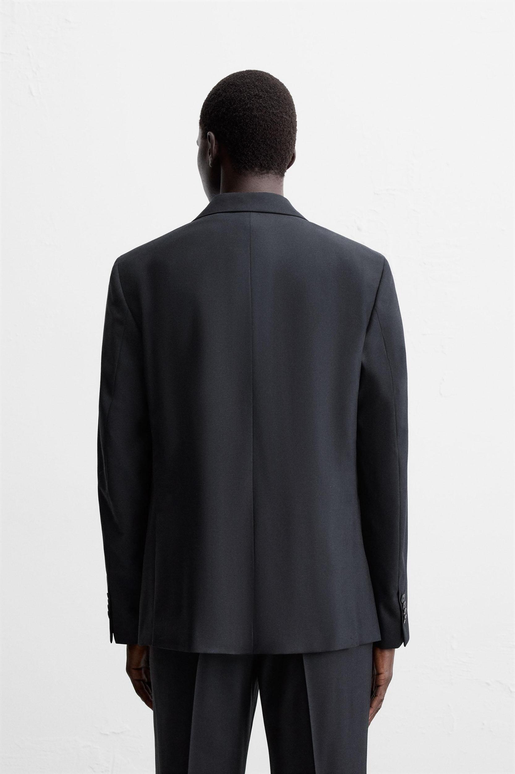 HERRINGBONE SUIT BLAZER Product Image