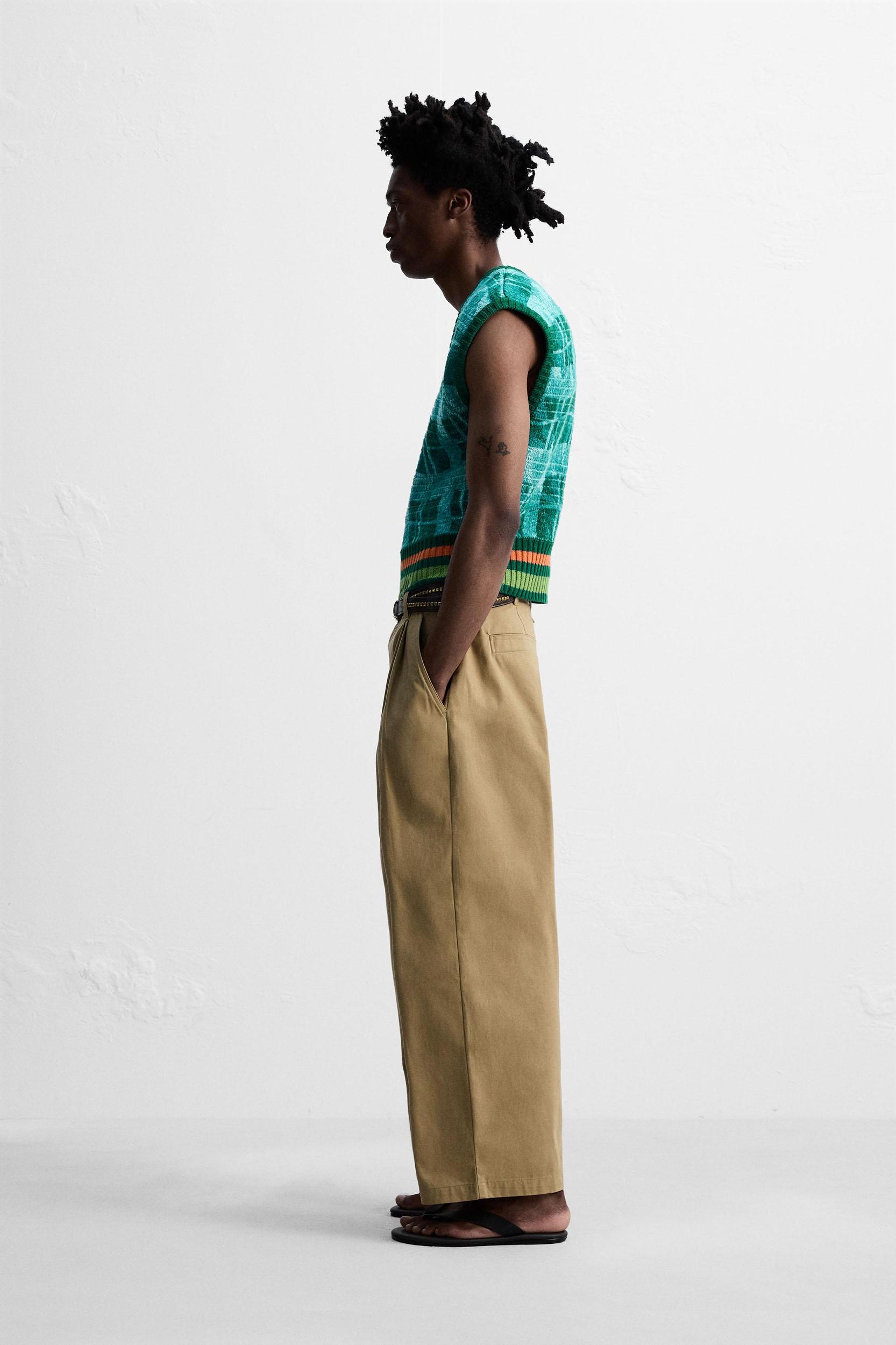 PLEATED WIDE FIT PANTS Product Image
