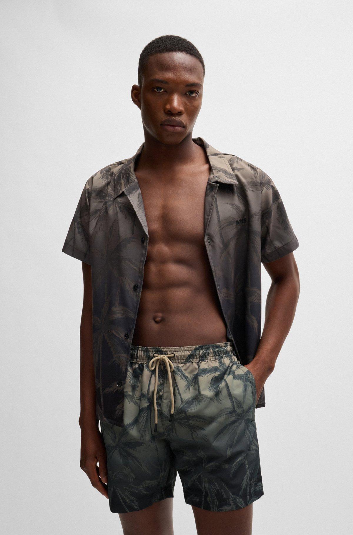 Quick-dry swim shorts with seasonal print Product Image