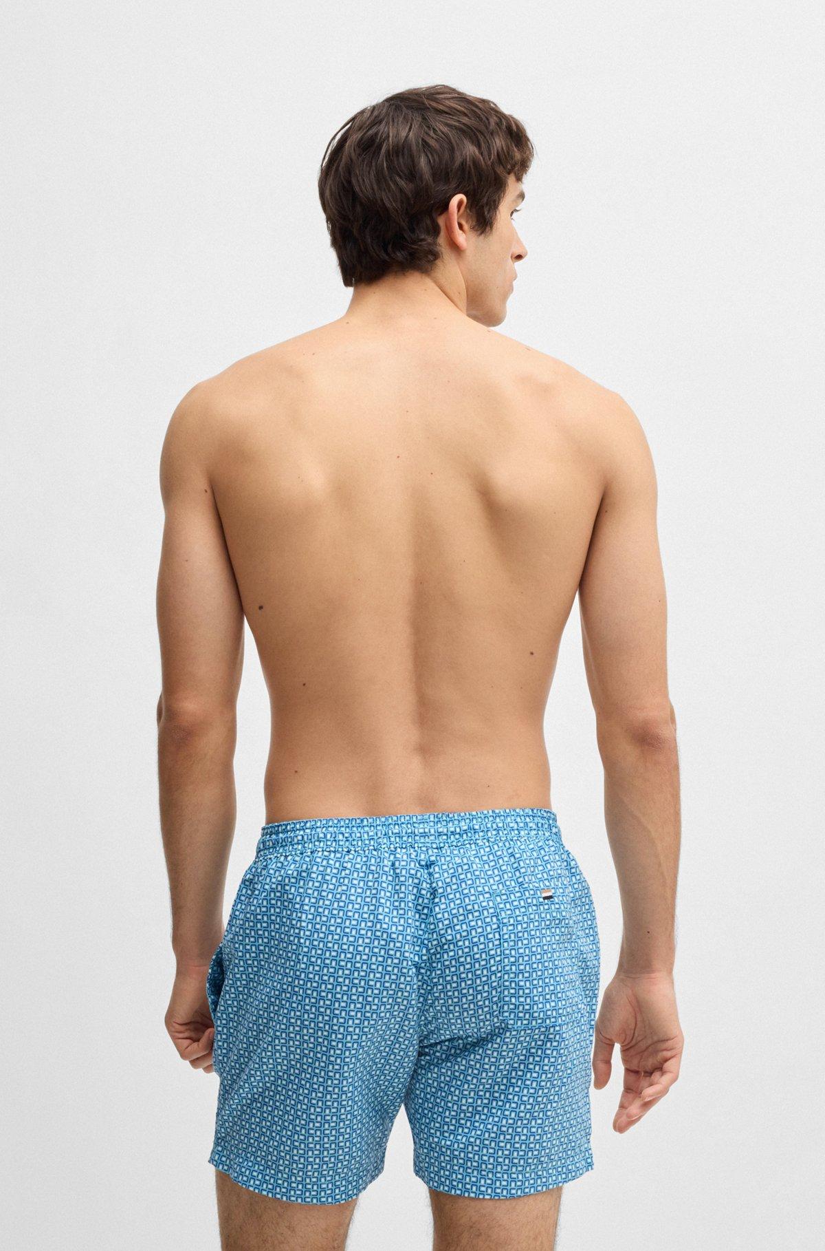 BOSS - Drawstring-waist swim shorts with all-over print - Light Blue Product Image