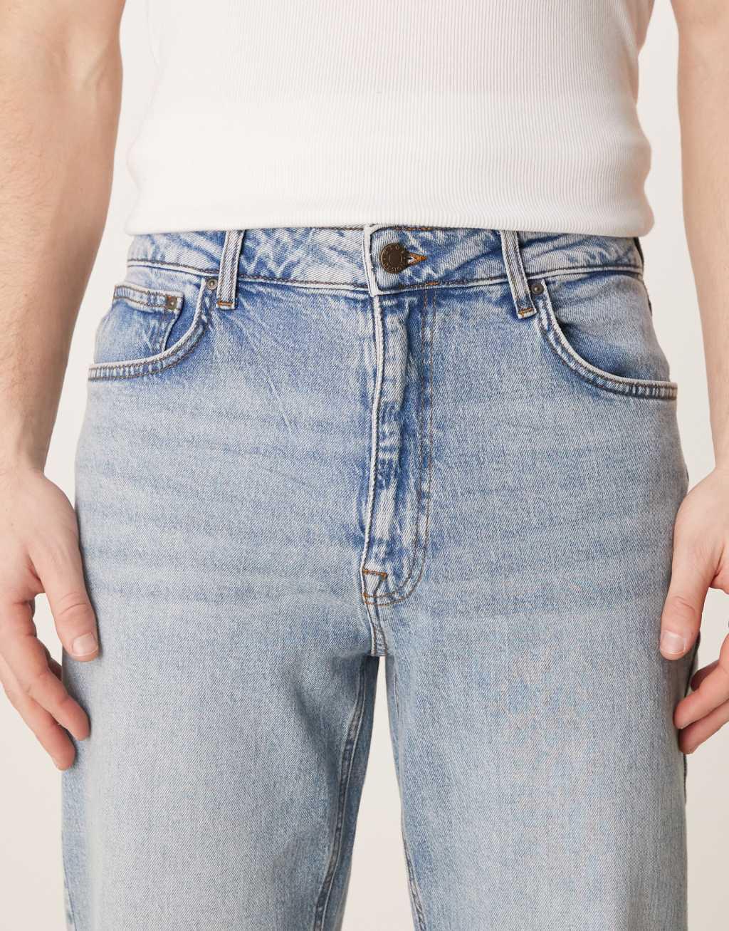 ASOS DESIGN straight stretch jeans with in mid wash blue Product Image