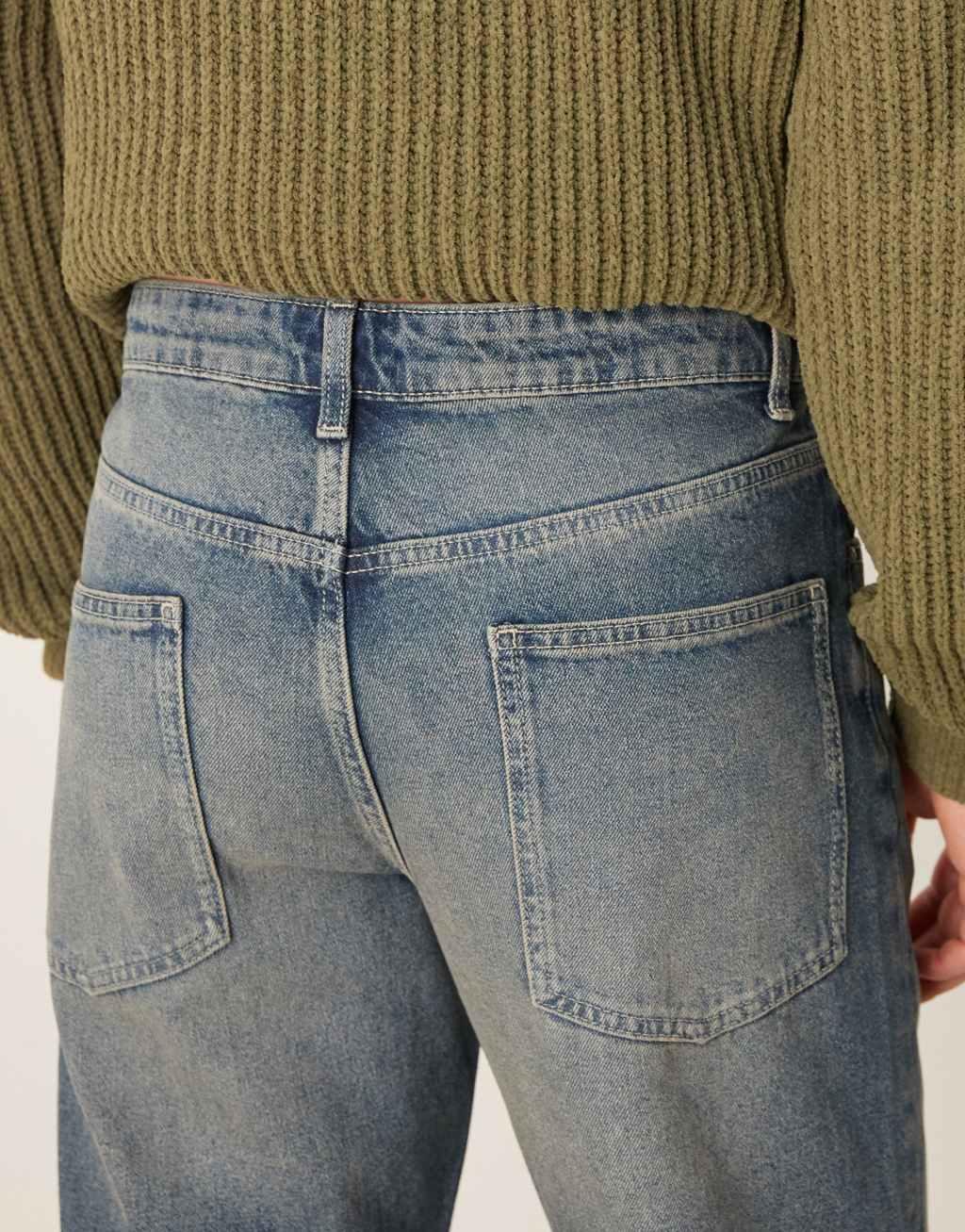 ASOS DESIGN tapered jeans in mid wash Product Image
