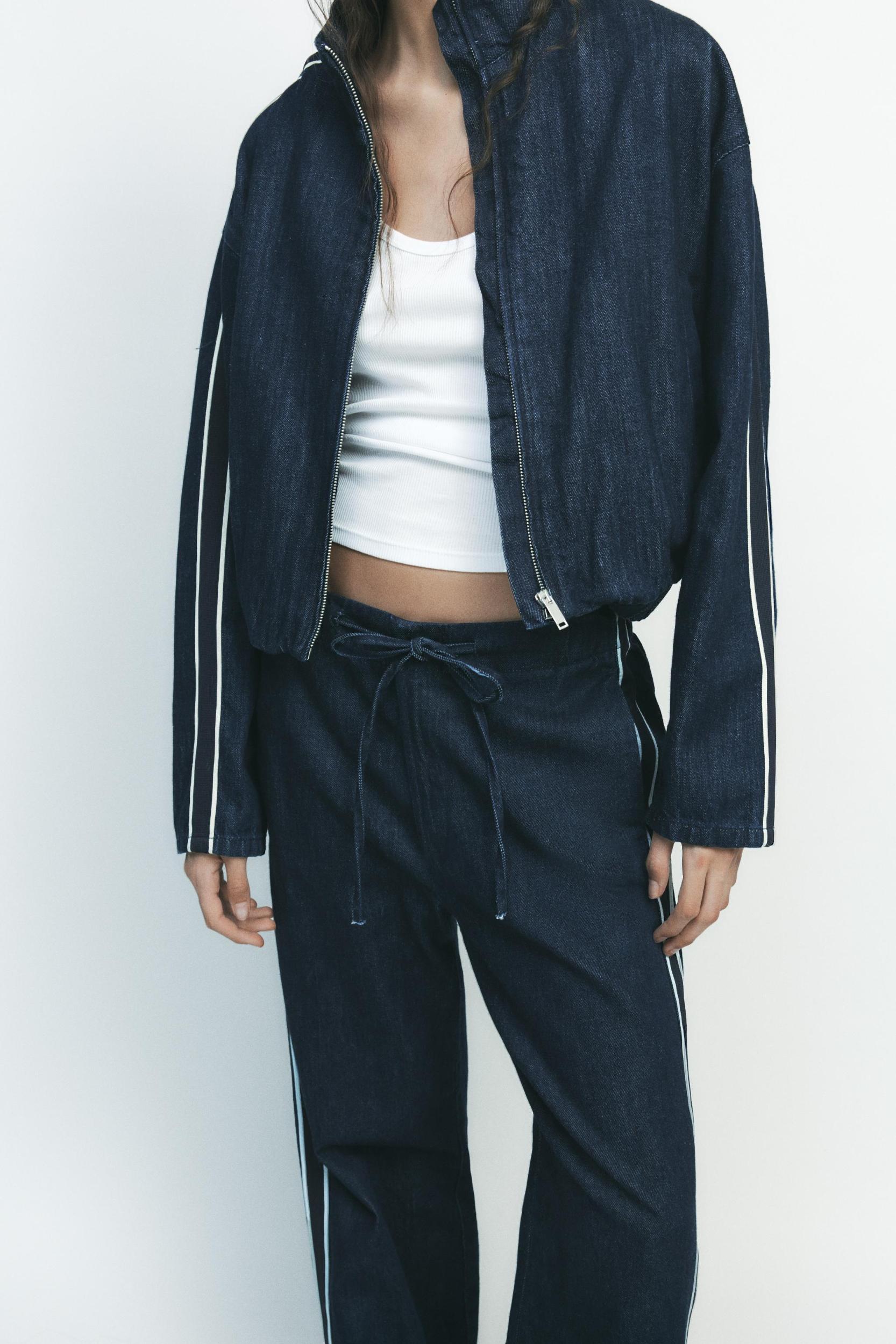 DENIM PANTS WITH SIDE BANDS Product Image