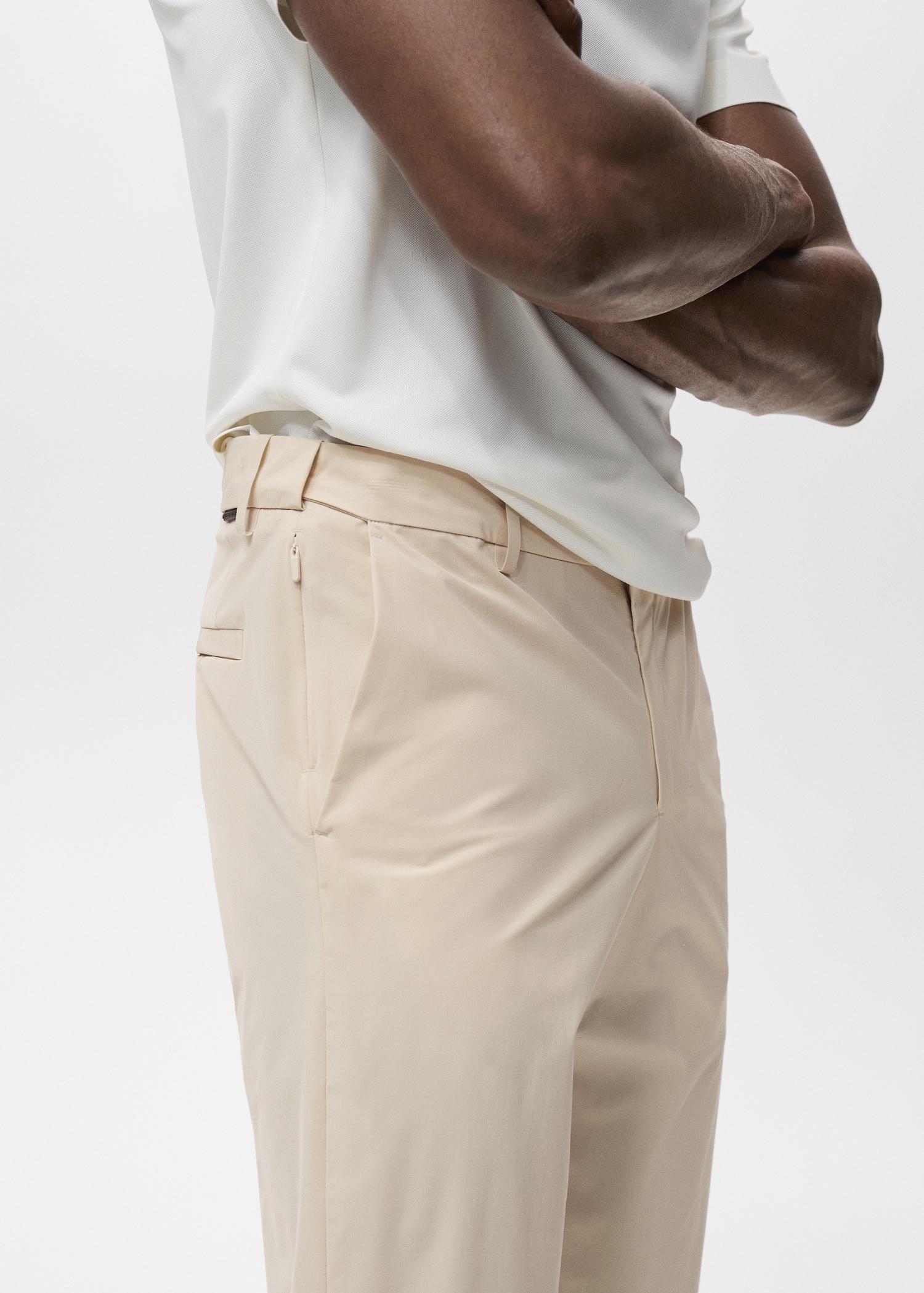Slim-fit water-repellent pants - Men | MANGO USA Product Image