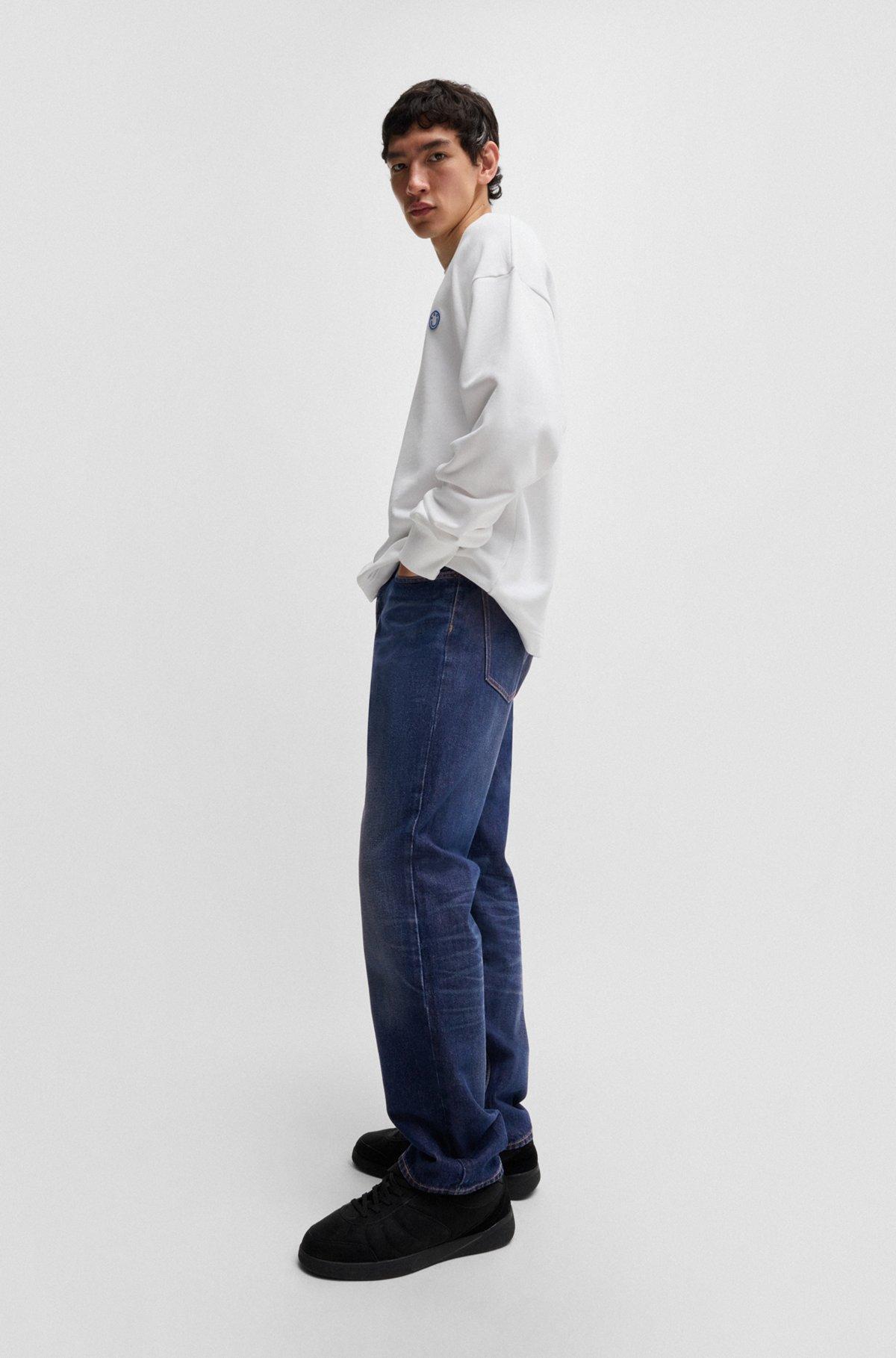 Regular-fit jeans in dark-blue stonewashed denim Product Image