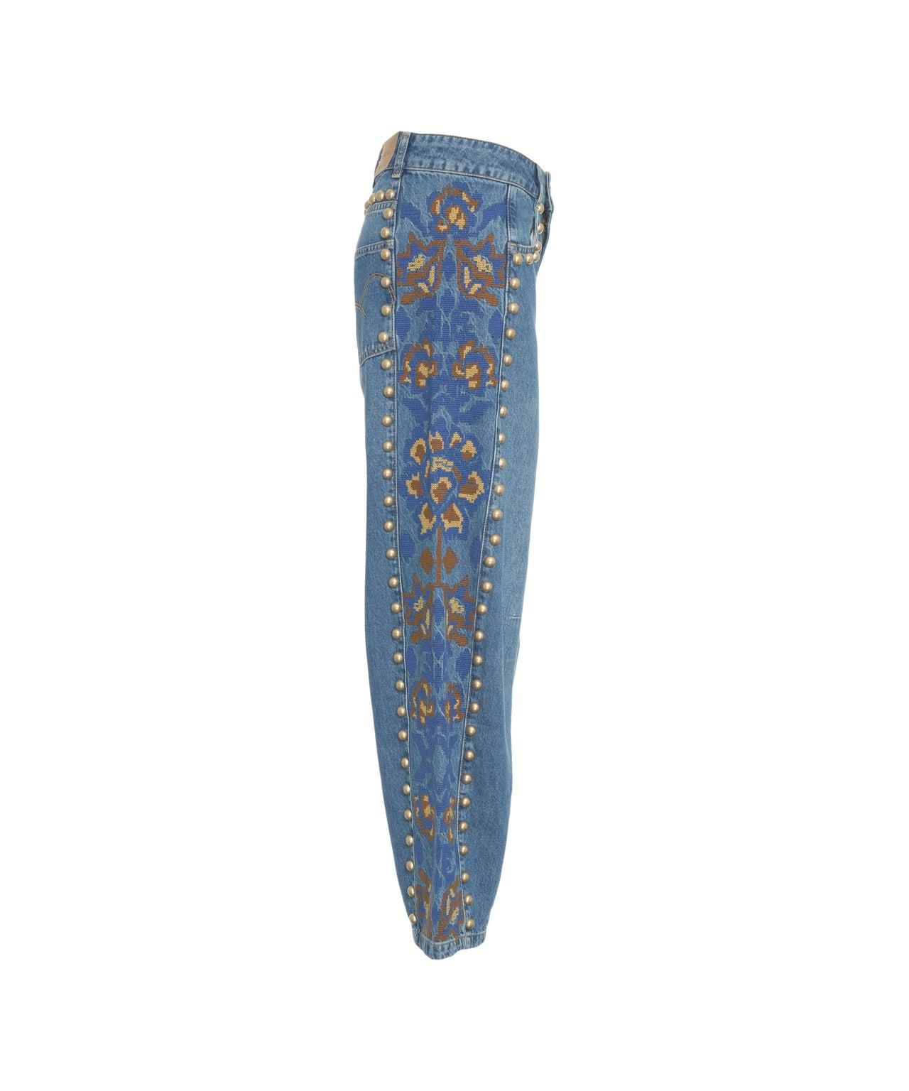 Jeans with studs and floral print Product Image