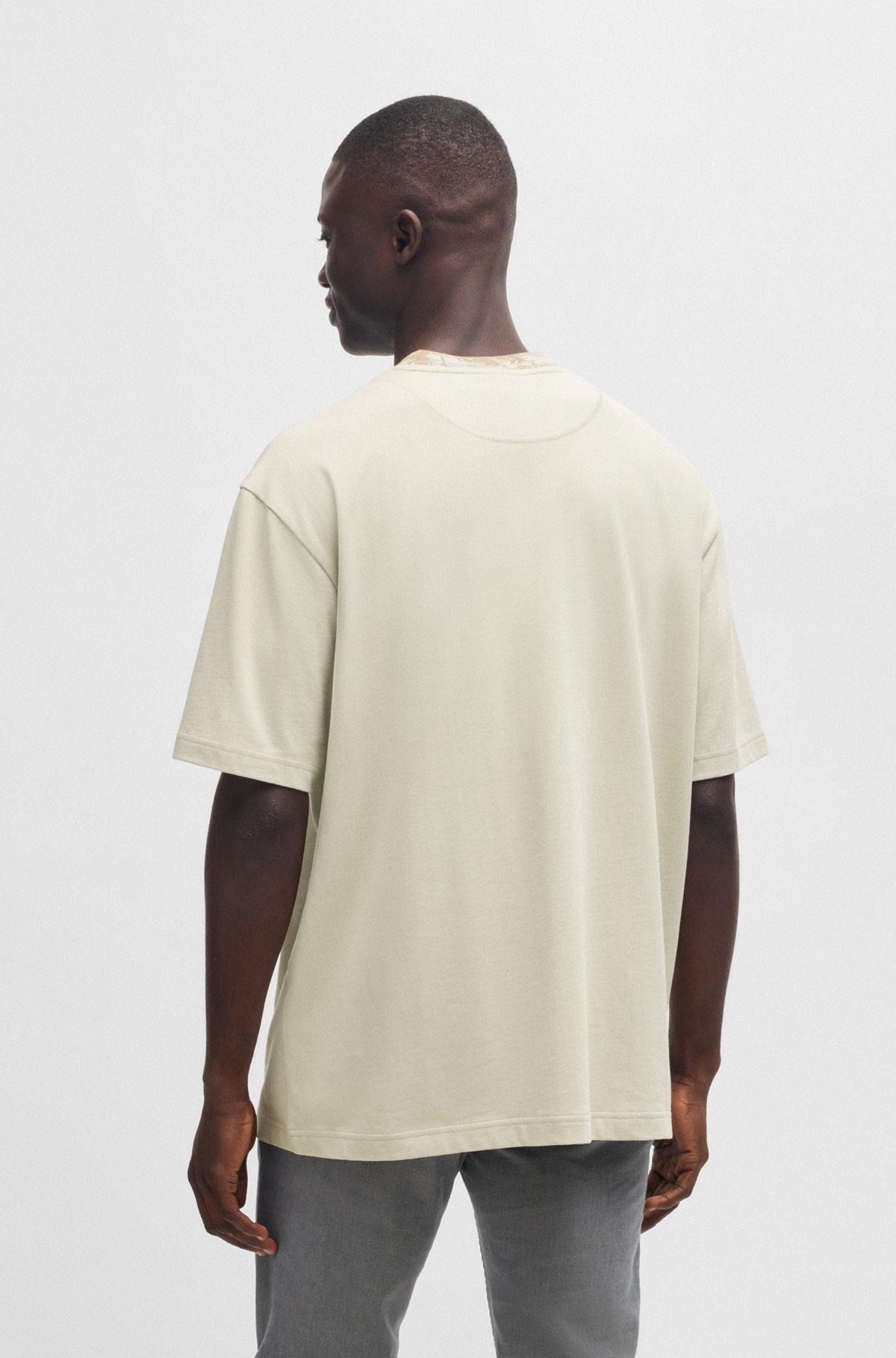 Cotton-jersey T-shirt with jungle-artwork collar Product Image