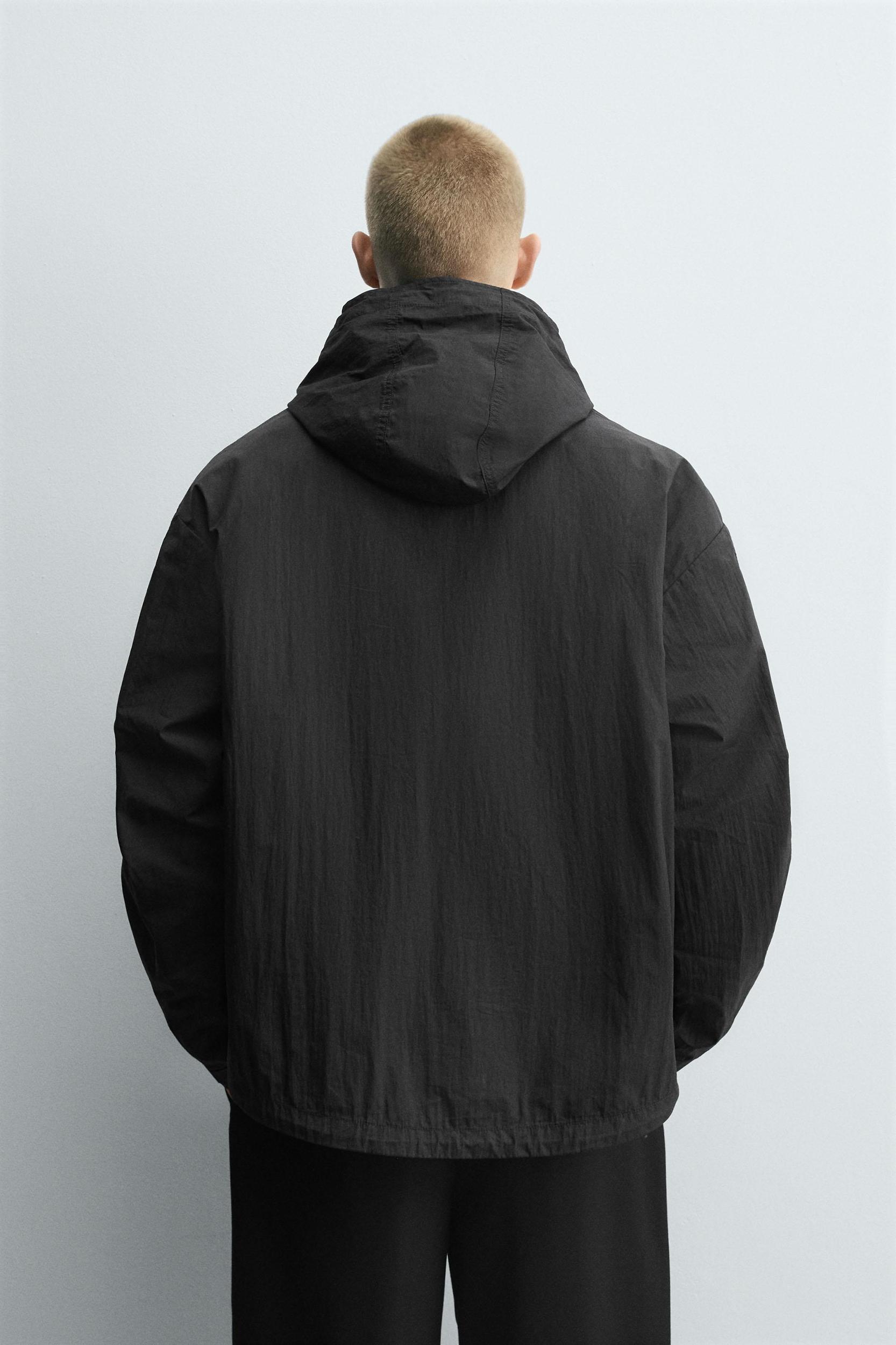 HOODED TECHNICAL JACKET Product Image