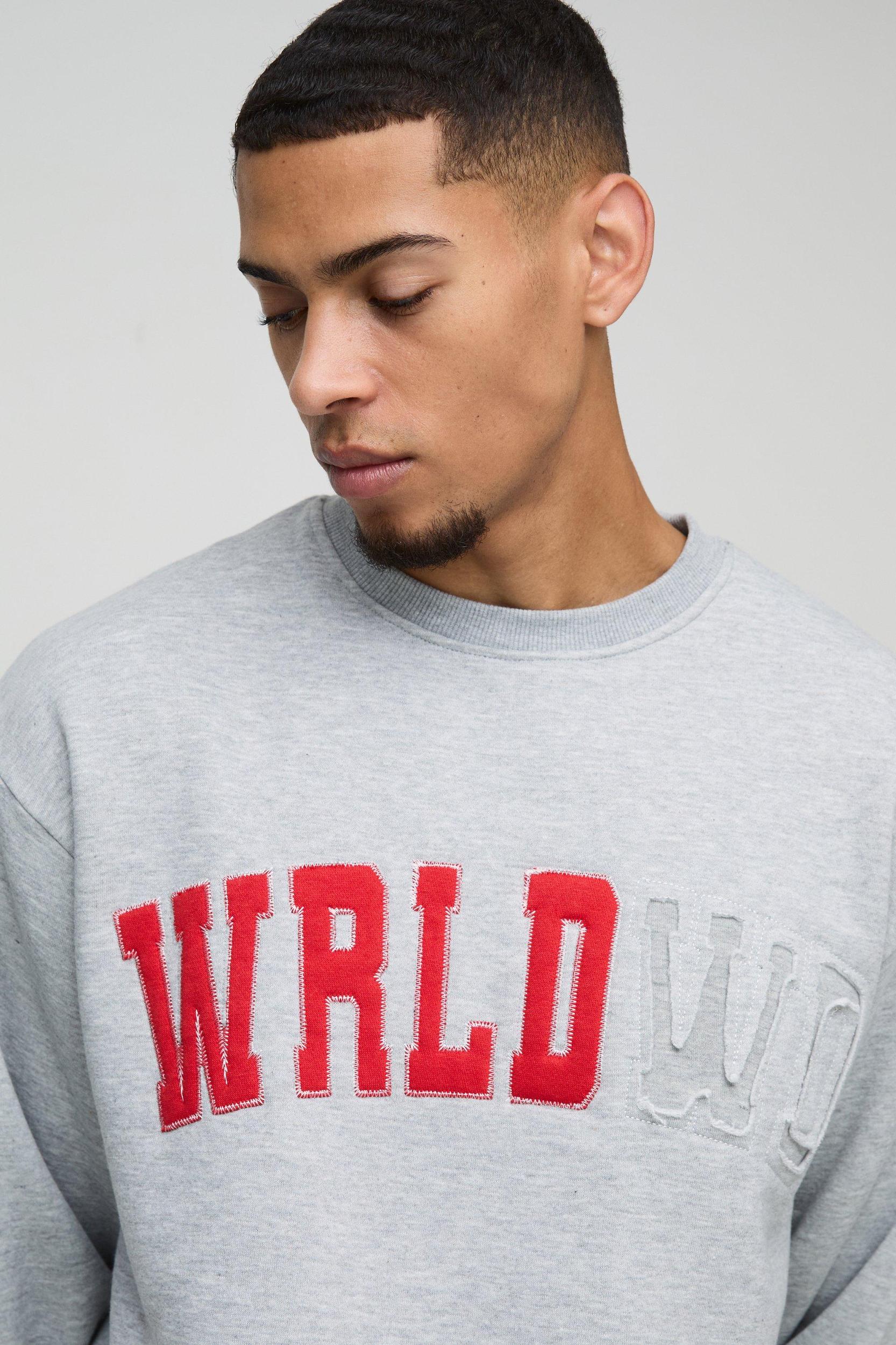 Oversized Boxy Worldwide Distressed Applique Sweatshirt | boohooMAN USA Product Image