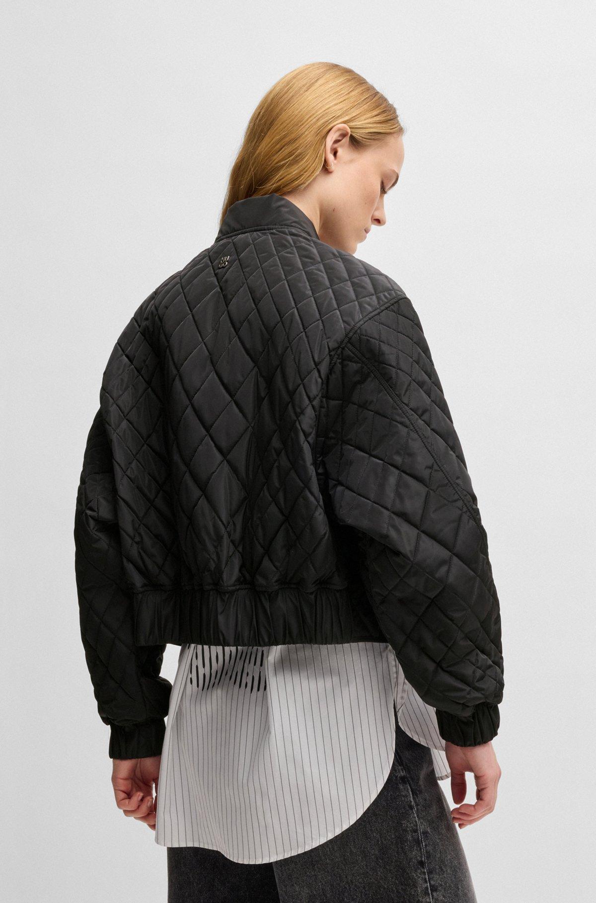 Quilted bomber jacket with ribbon zip-puller Product Image