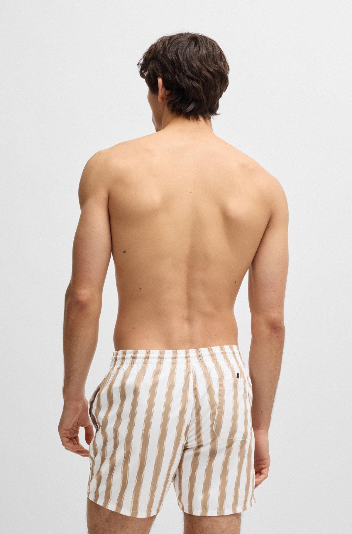 BOSS - Fully lined swim shorts with seasonal print - White Product Image
