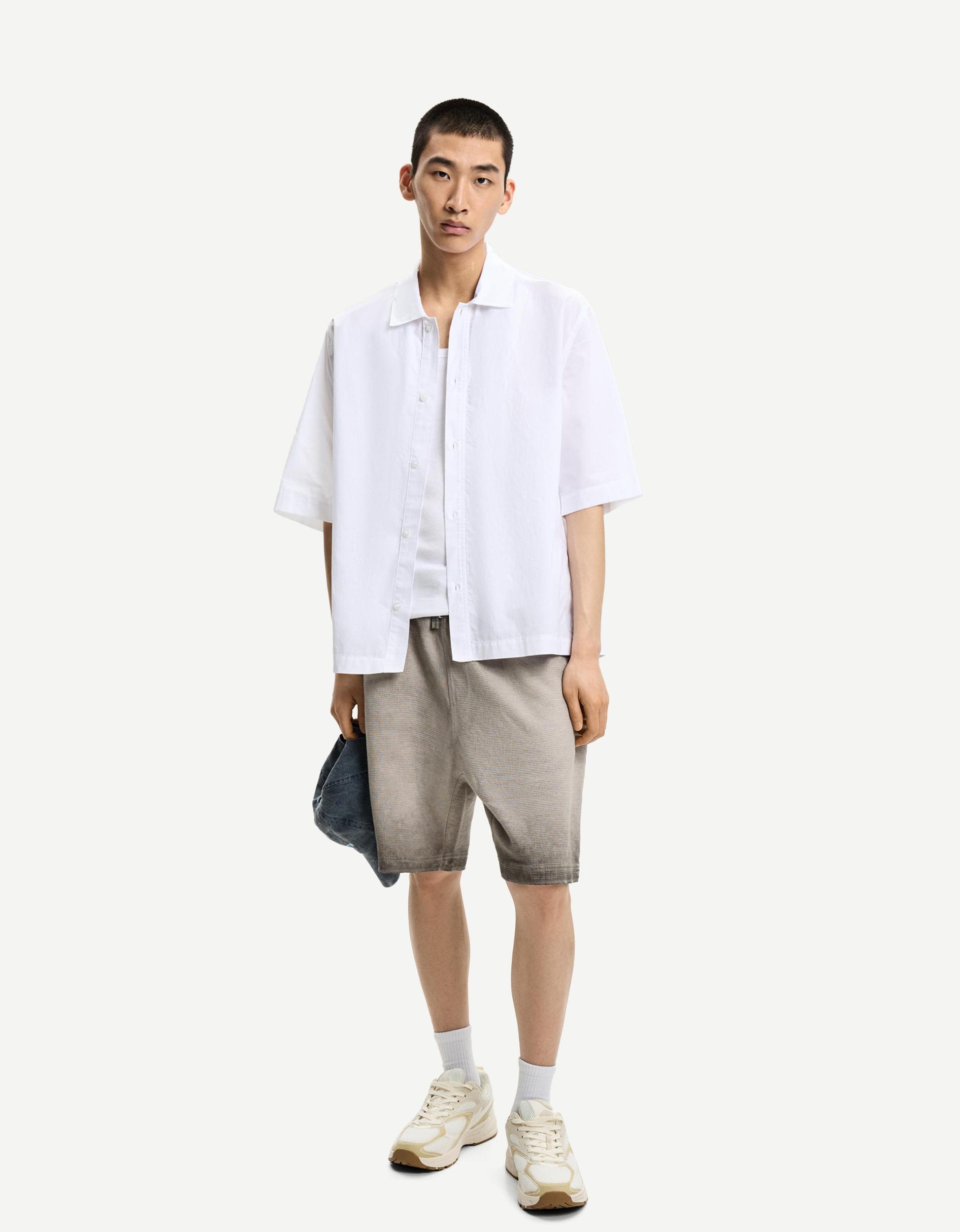 Faded waffle-knit Bermuda shorts Product Image