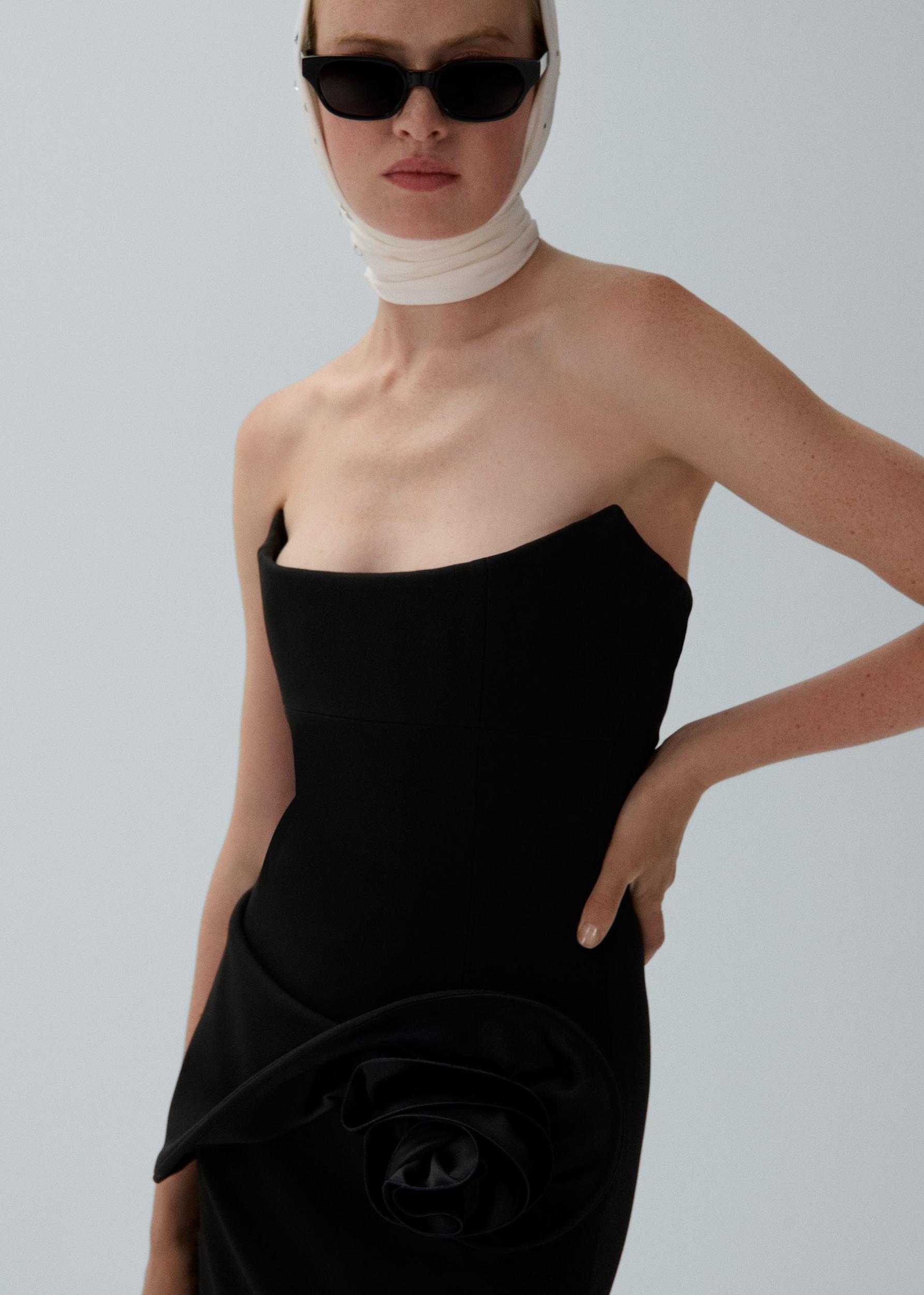 Floral appliqué bustier midi dress in black Product Image