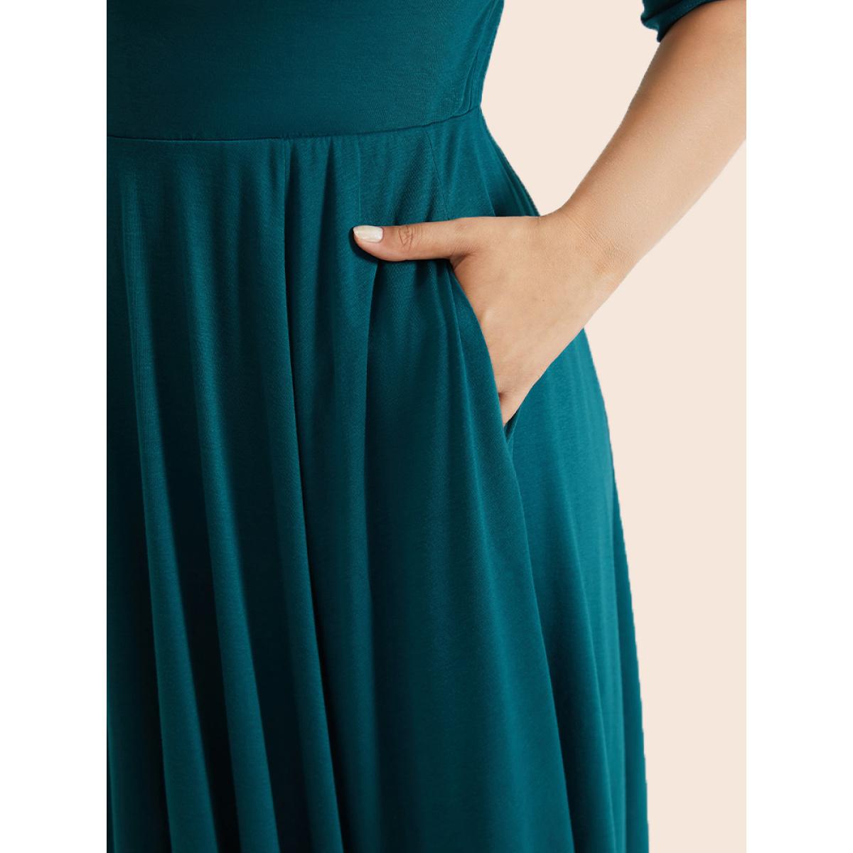 Plus Size Solid Ruched Pocket Asymmetrical Hem Dress Cerulean Women Elegant Gathered V-neck Short sleeve Curvy Midi Dress BloomChic 28/5X Product Image