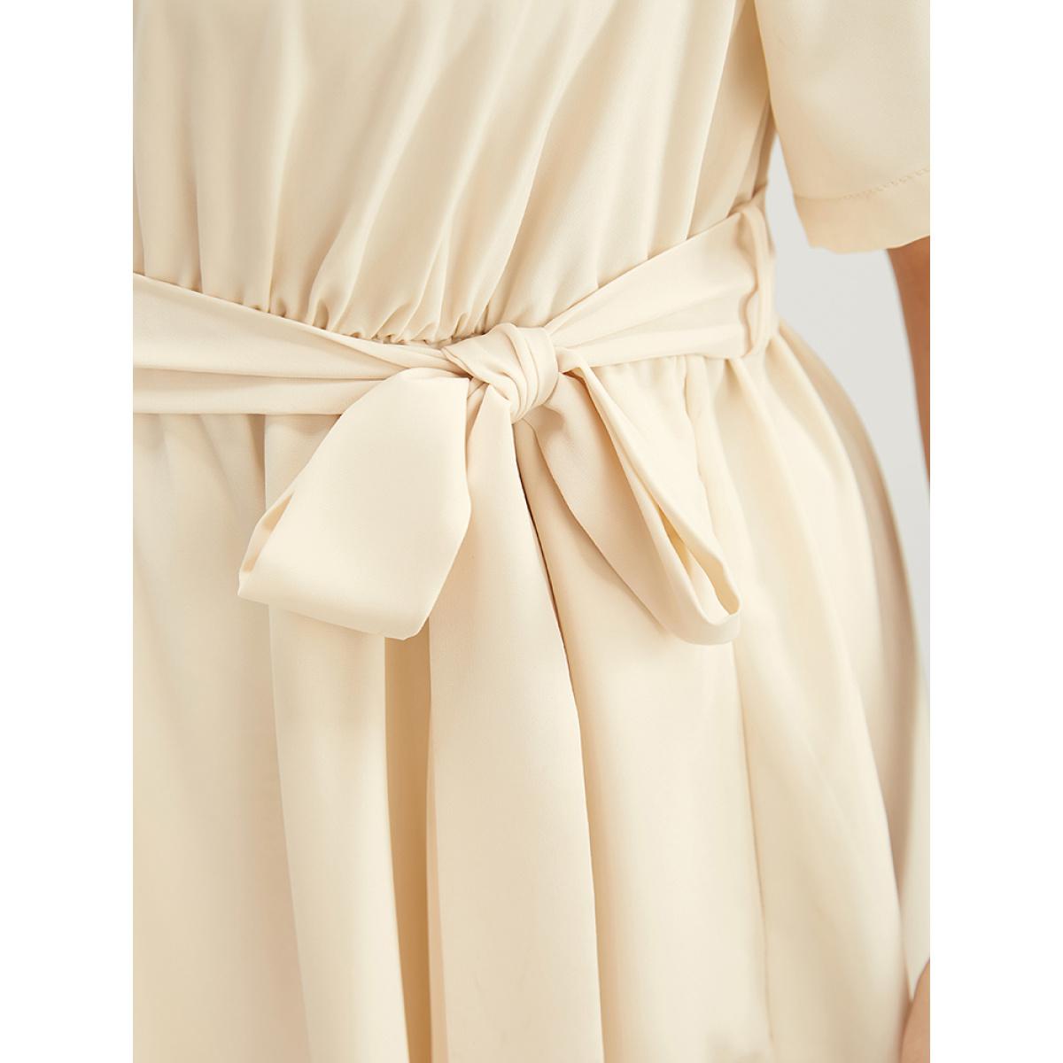 Plus Size Solid Chain Detail Cut Out Pocket Belted Flutter Dress Beige Women Office Cross straps V-neck Short sleeve Curvy Midi Dress BloomChic 30/6X Product Image