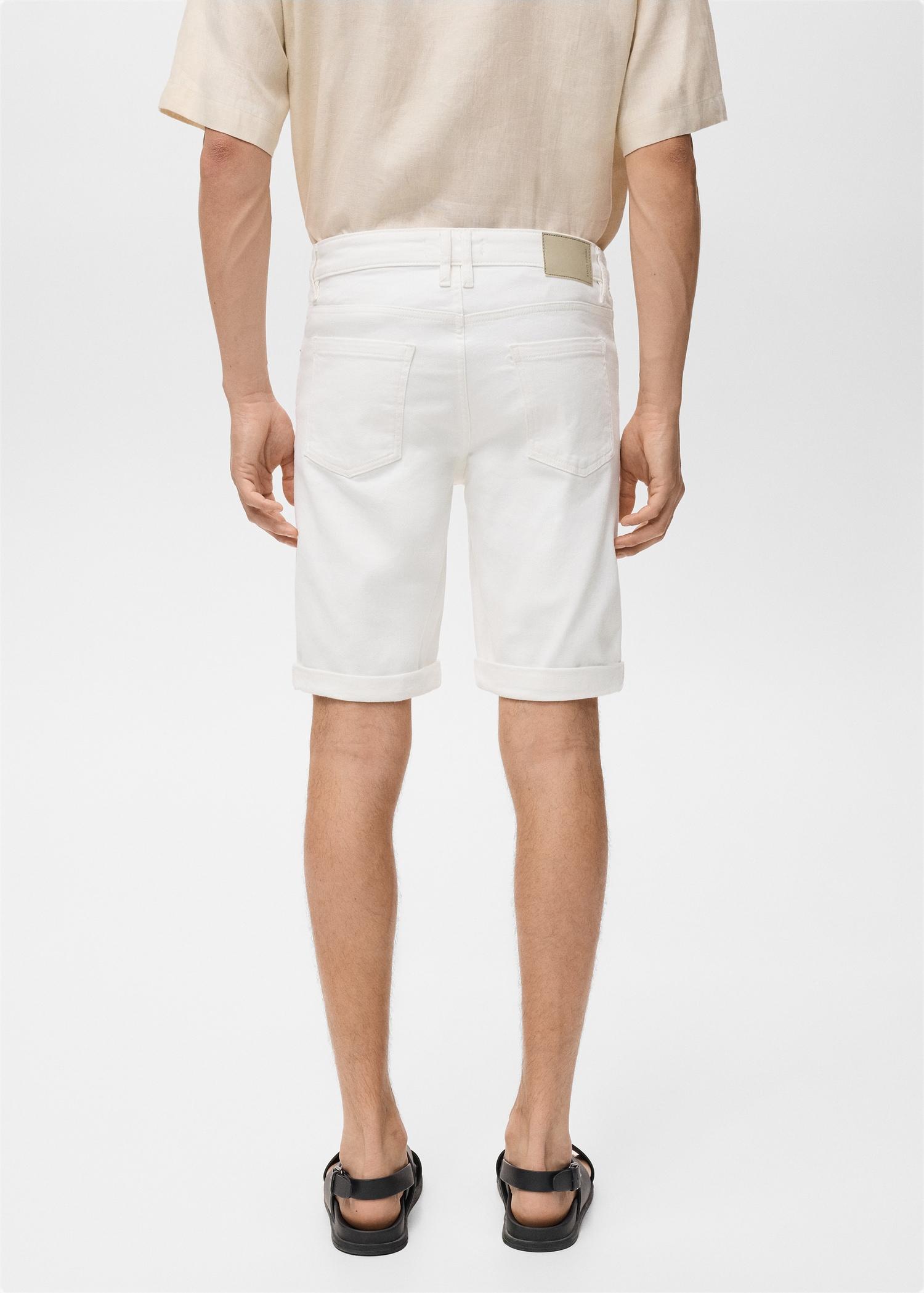 Slim-fit denim bermuda shorts - Men | MANGO USA Product Image