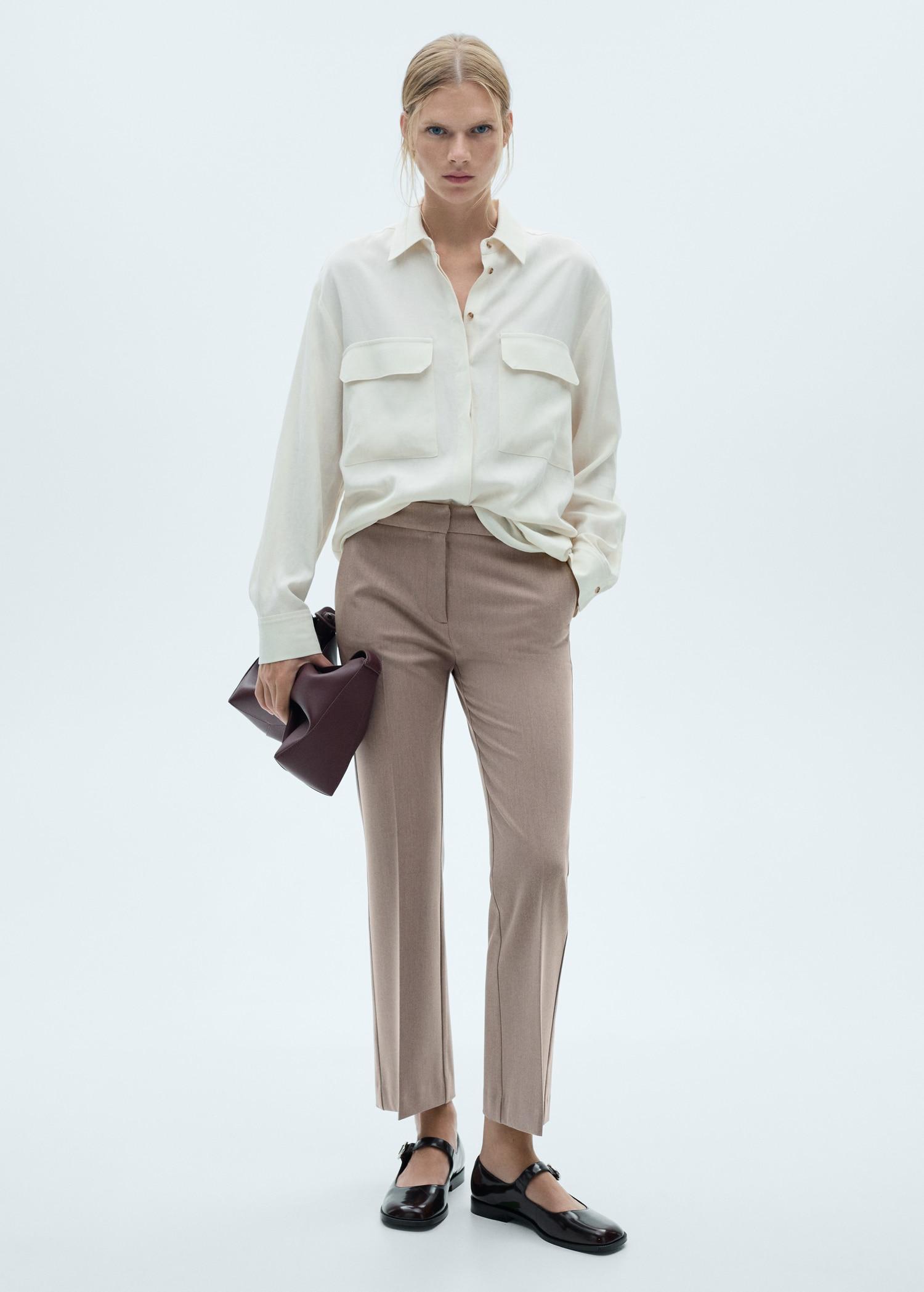 Flared flowing pants - Women | MANGO USA Product Image