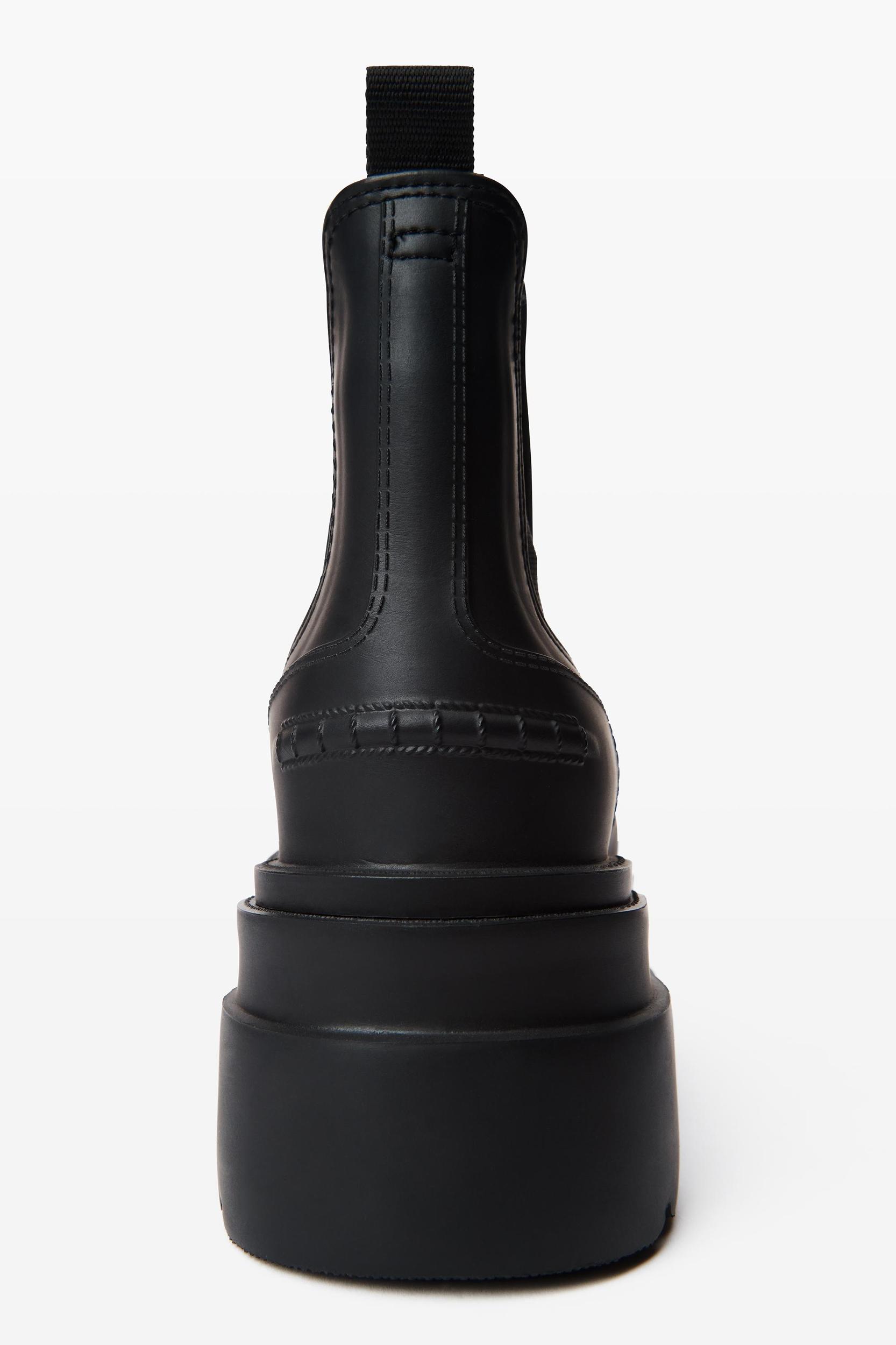 Carter 75mm Ankle Platform Boot In Rubber Product Image