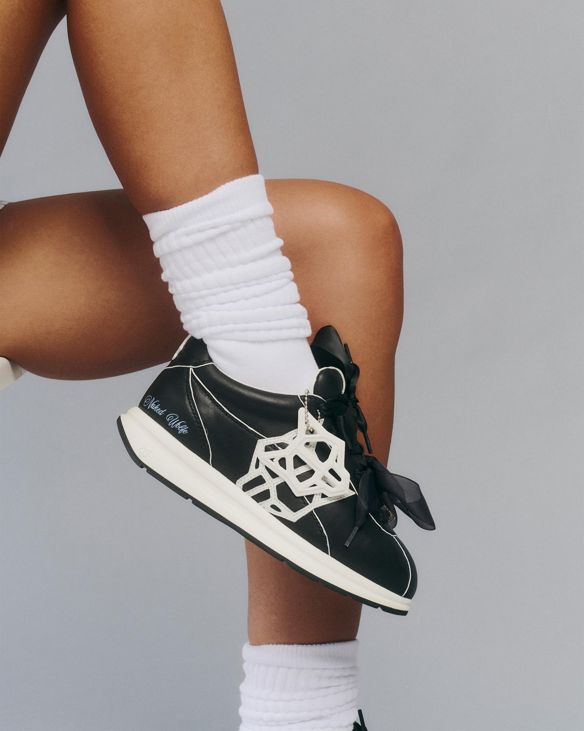 Expense Black Leather Product Image