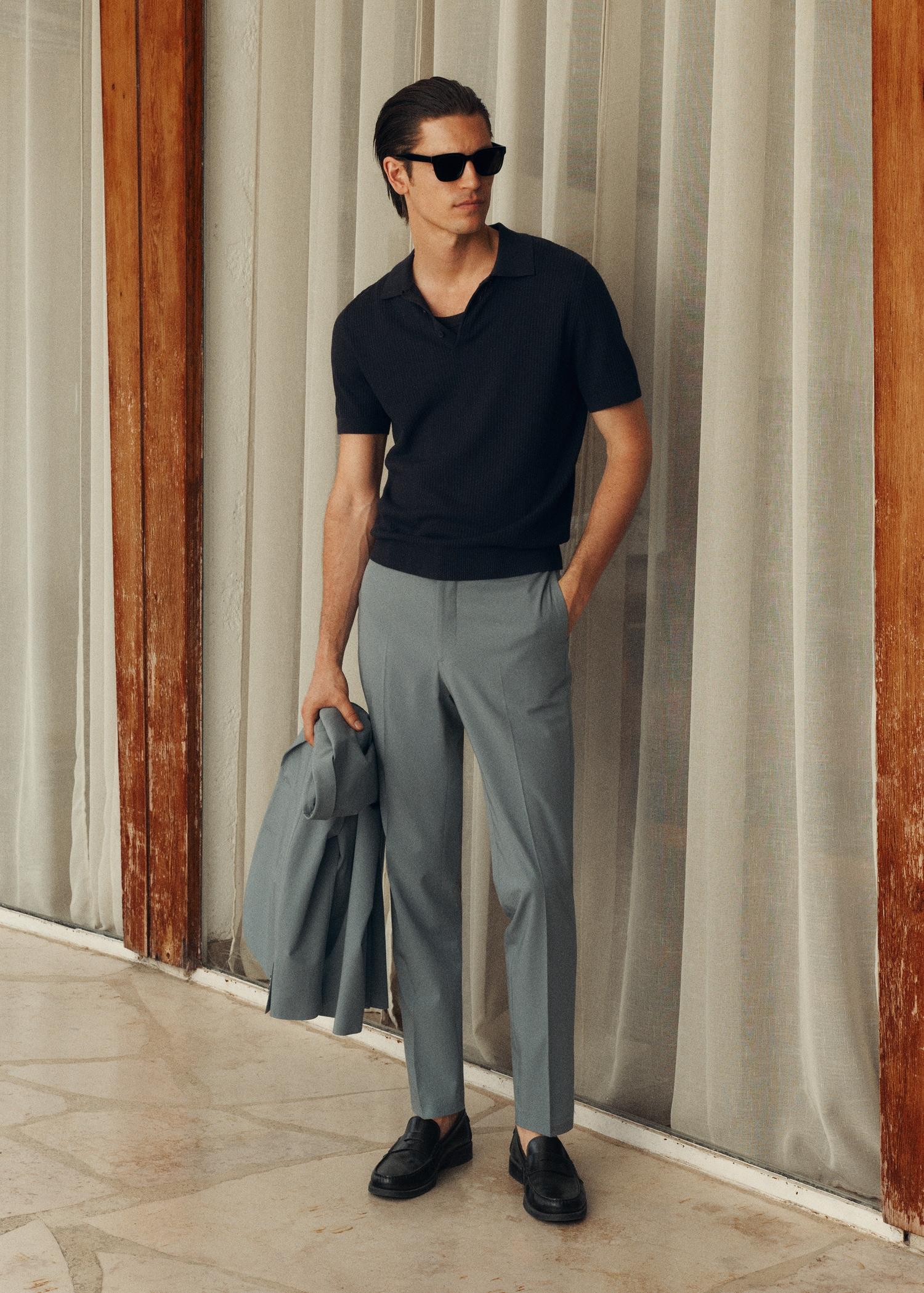 Ribbed knit polo shirt - Men | MANGO USA Product Image