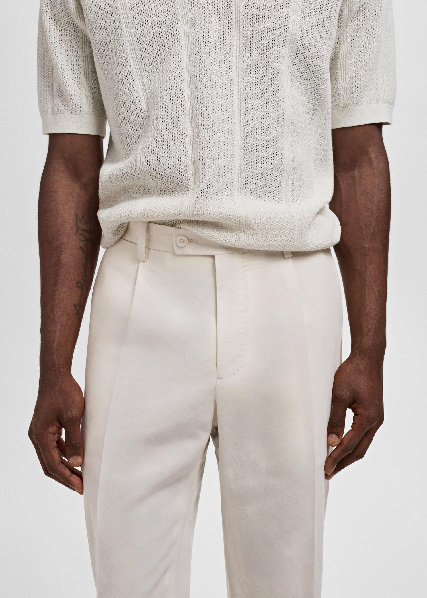 Slim-fit pleated linen pants - Men | MANGO USA Product Image