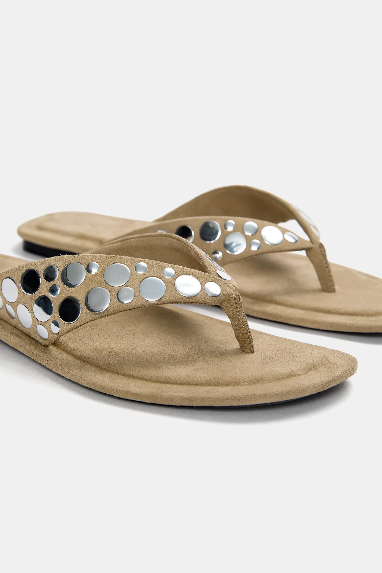Flat sandals with decorations Product Image