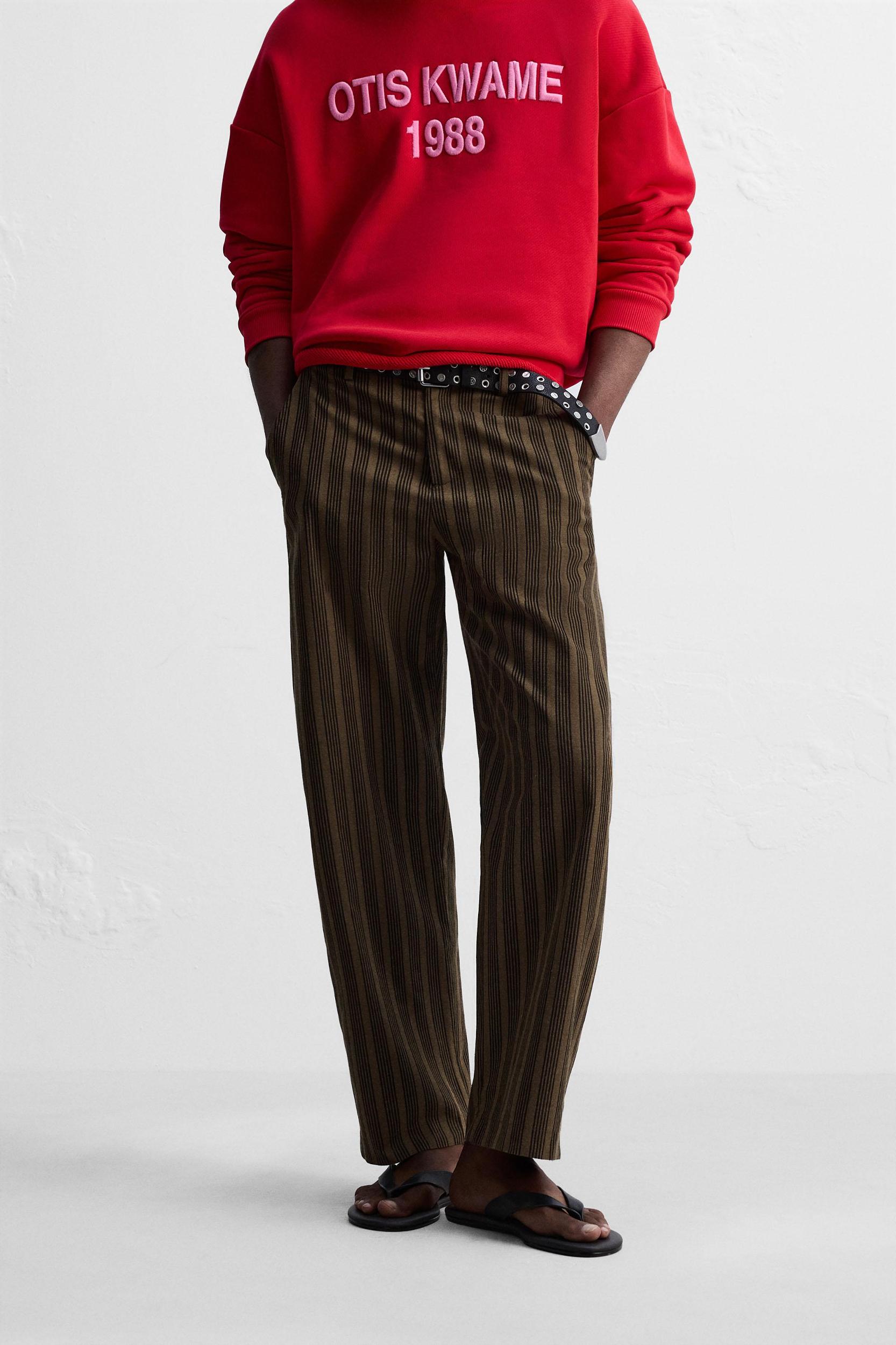 STRIPED BALLOON FIT PANTS © OTIS KWAME KYE QUAICOE Product Image